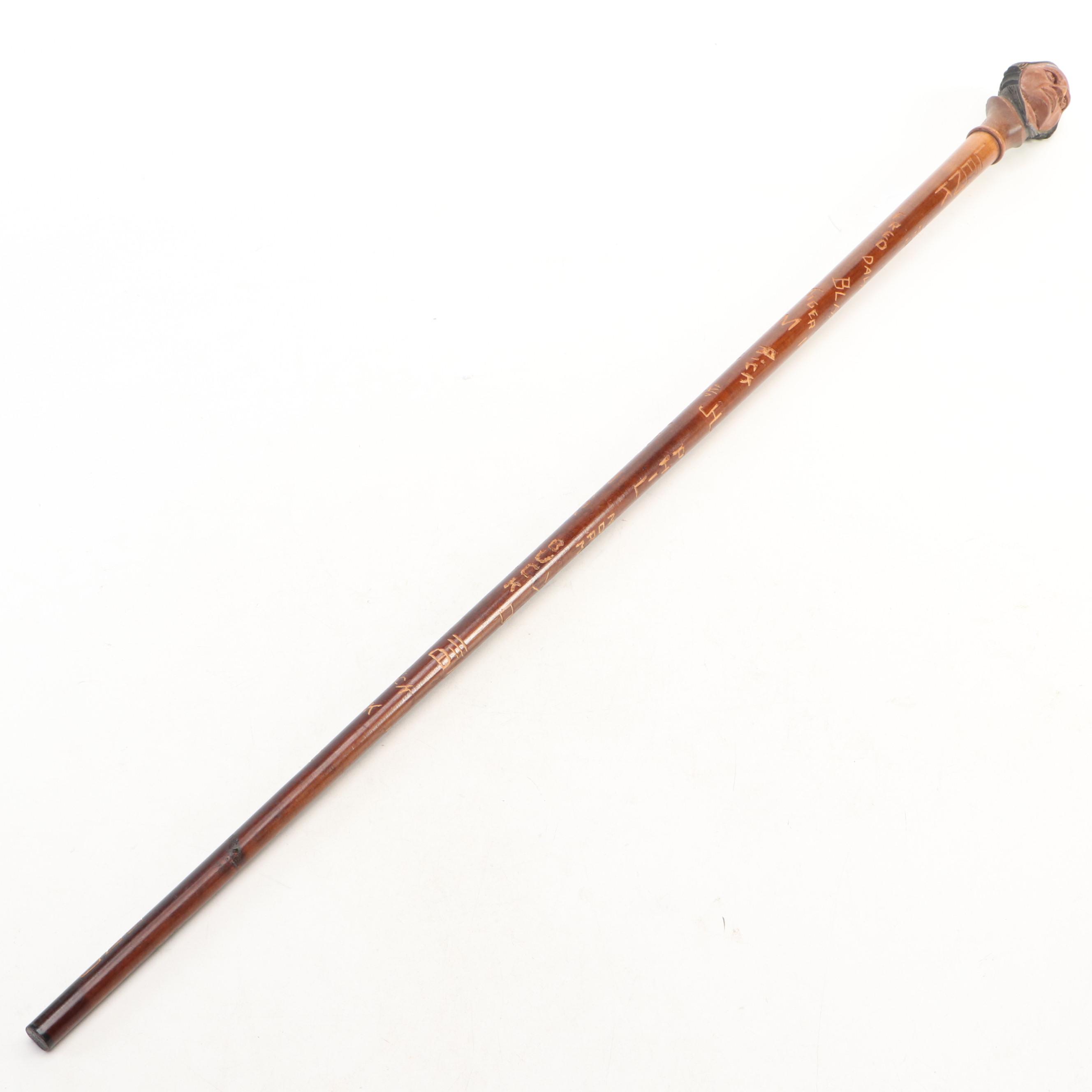 Carved Wooden Cane with Figural Handle