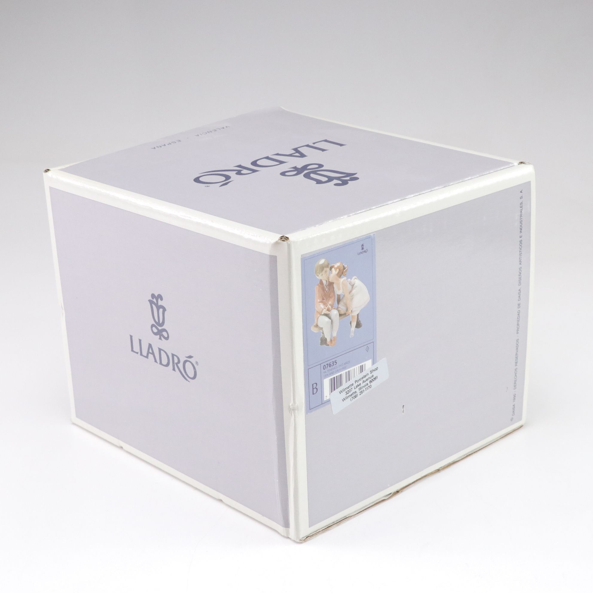 Lladró "Ten and Growing" Porcelain Figurine Designed by Francisco Polope, 1995