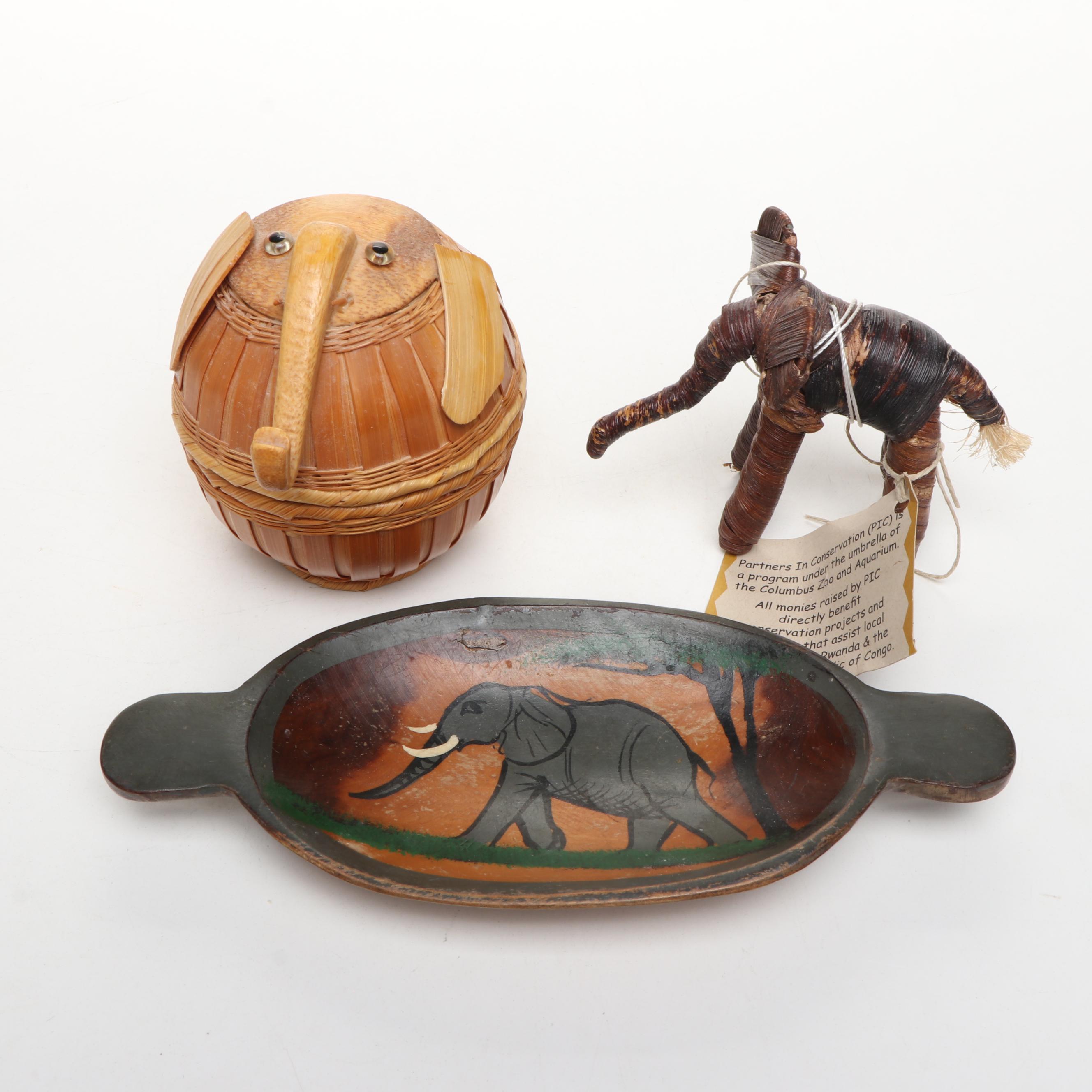 Kuba Porcelain Elephant Plate with Carved Wood and Other Elephants