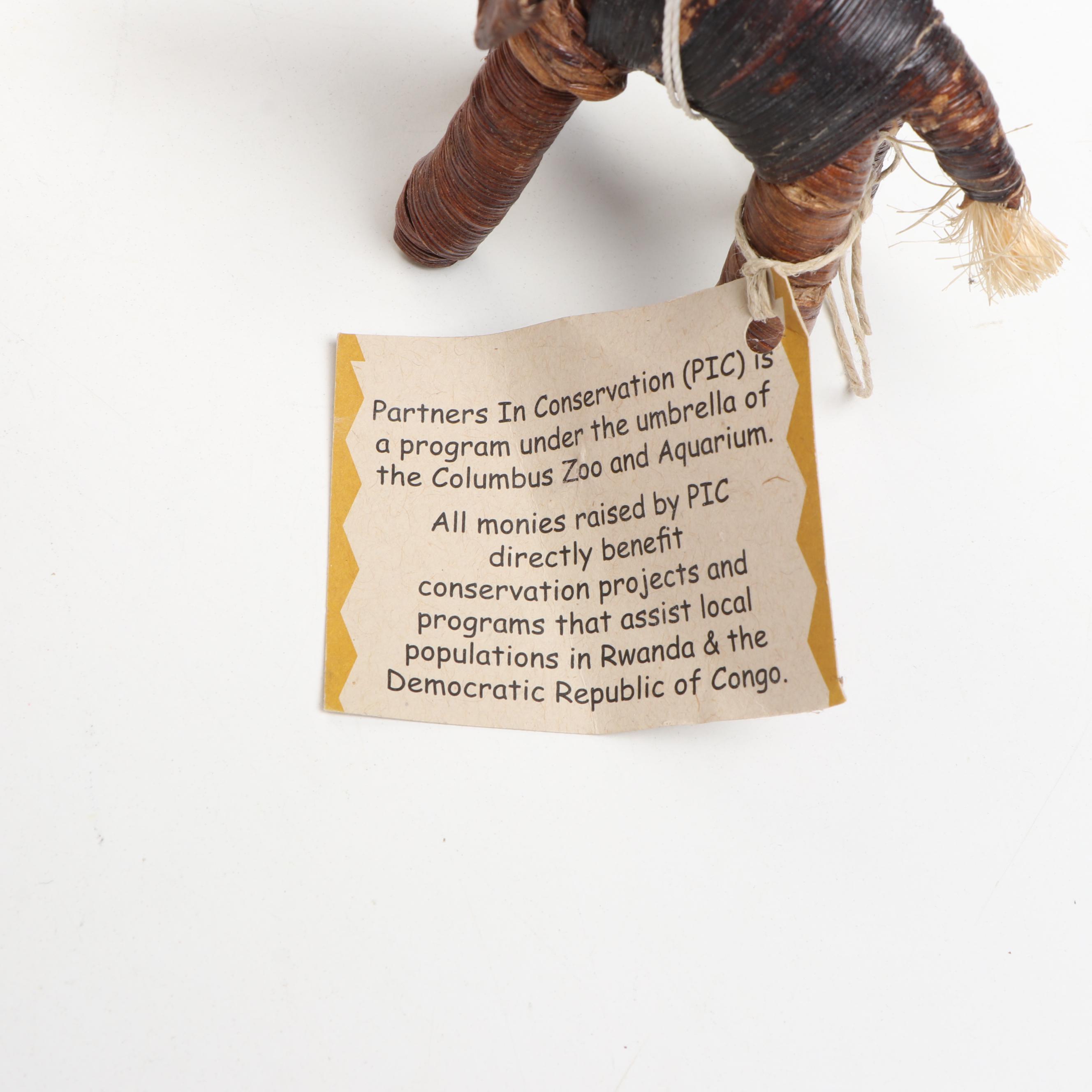 Kuba Porcelain Elephant Plate with Carved Wood and Other Elephants