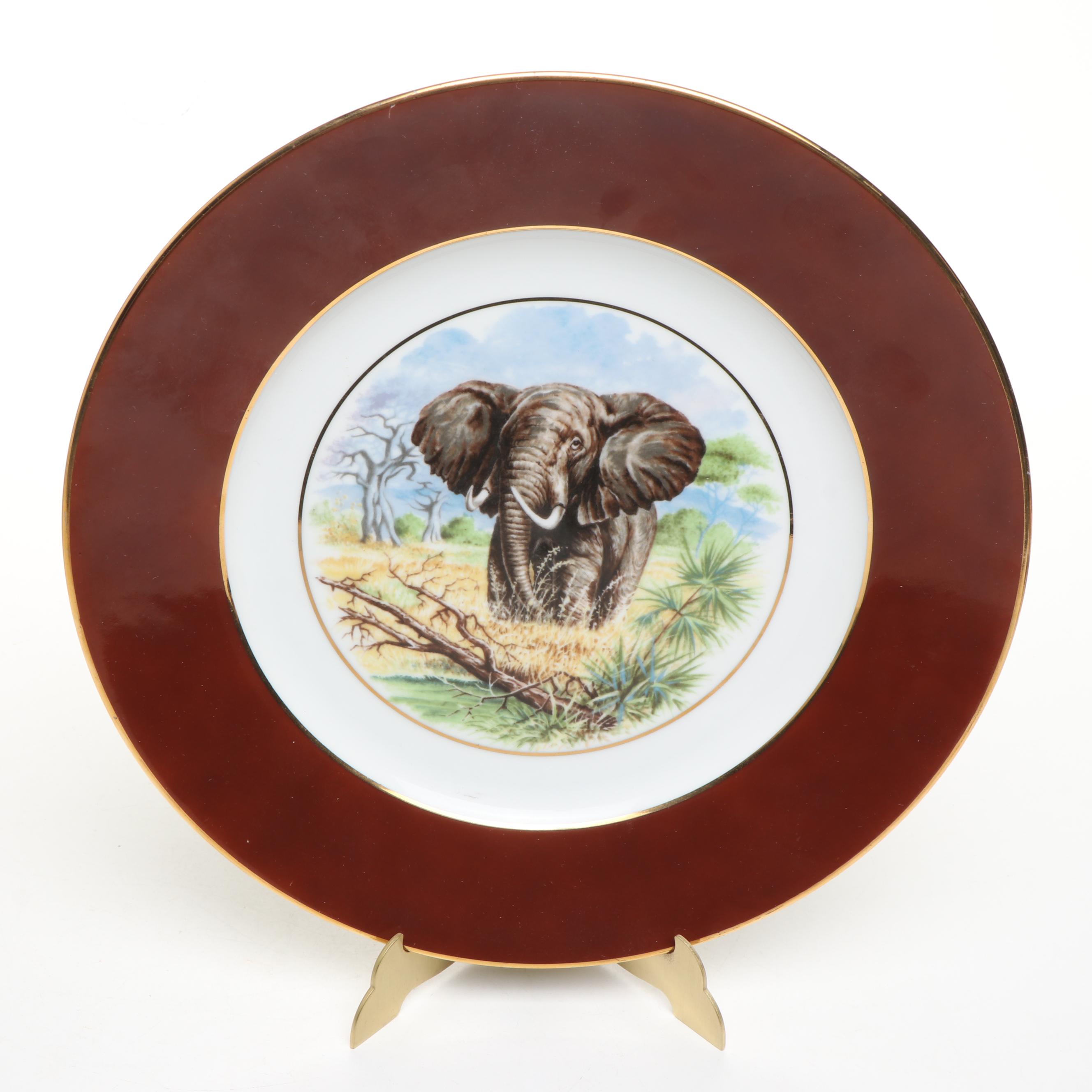 Kuba Porcelain Elephant Plate with Carved Wood and Other Elephants