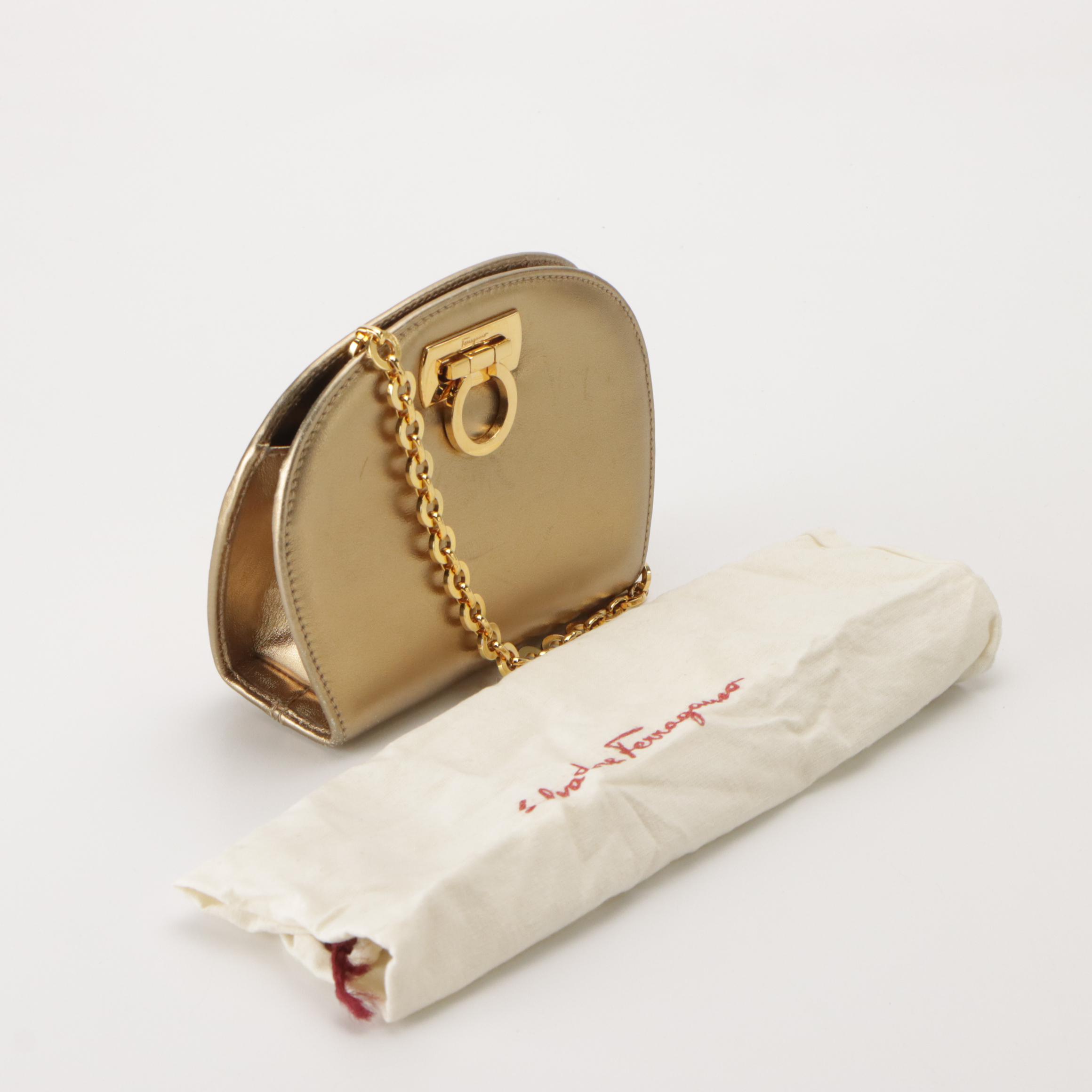 Salvatore Ferragamo Gancini-Lock Clutch on Chain in Metallic Gold Leather
