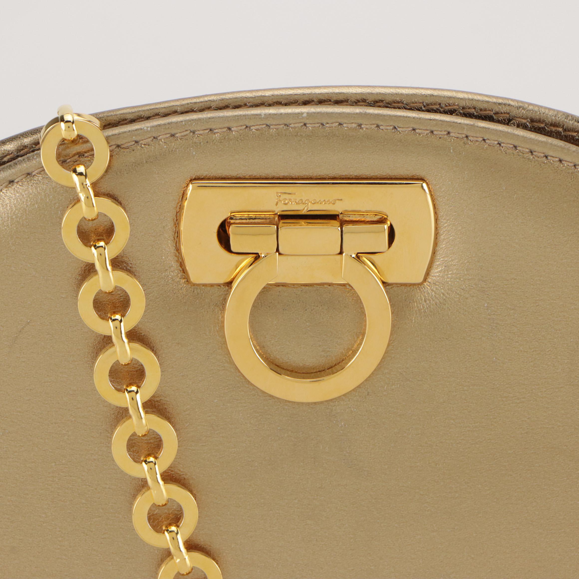 Salvatore Ferragamo Gancini-Lock Clutch on Chain in Metallic Gold Leather