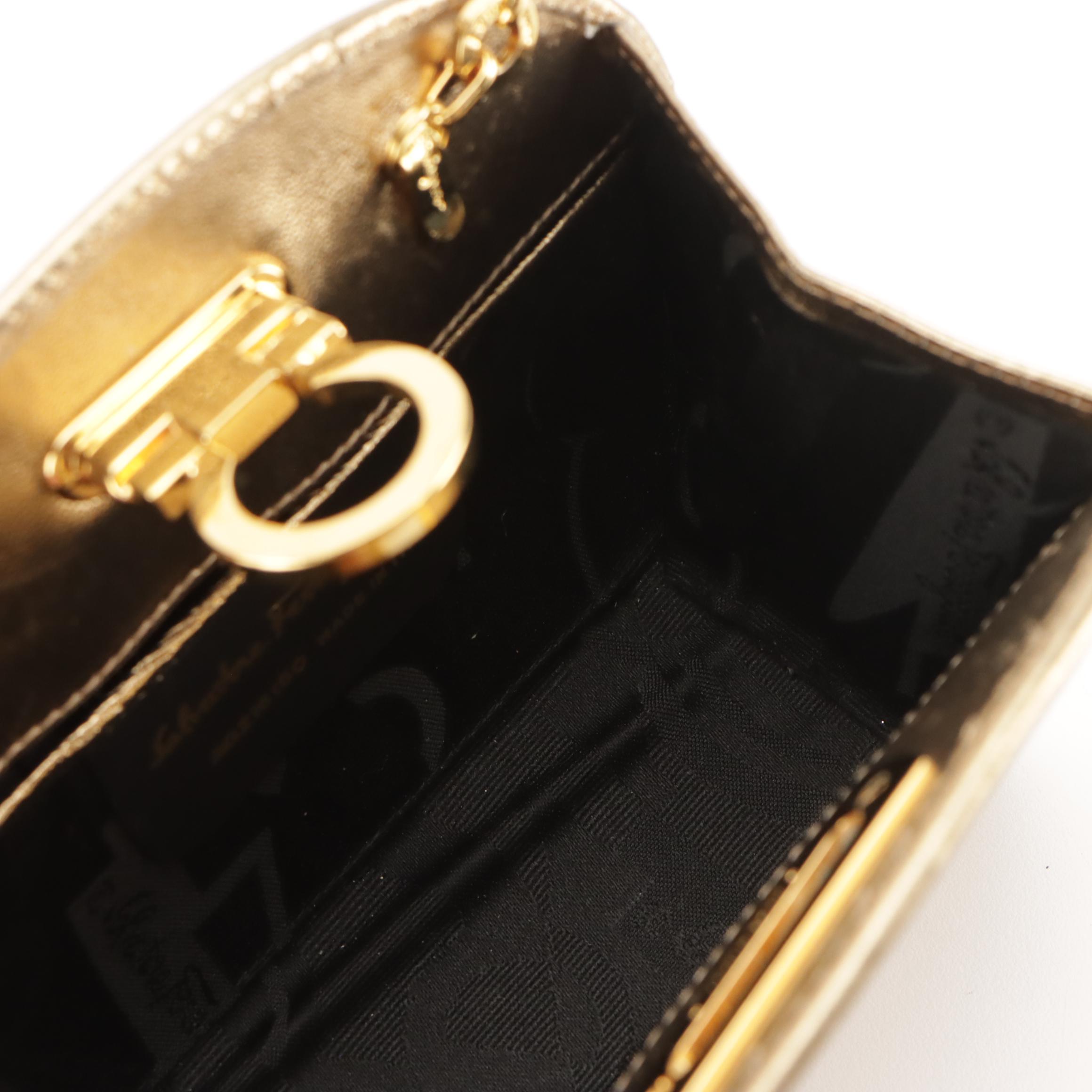 Salvatore Ferragamo Gancini-Lock Clutch on Chain in Metallic Gold Leather