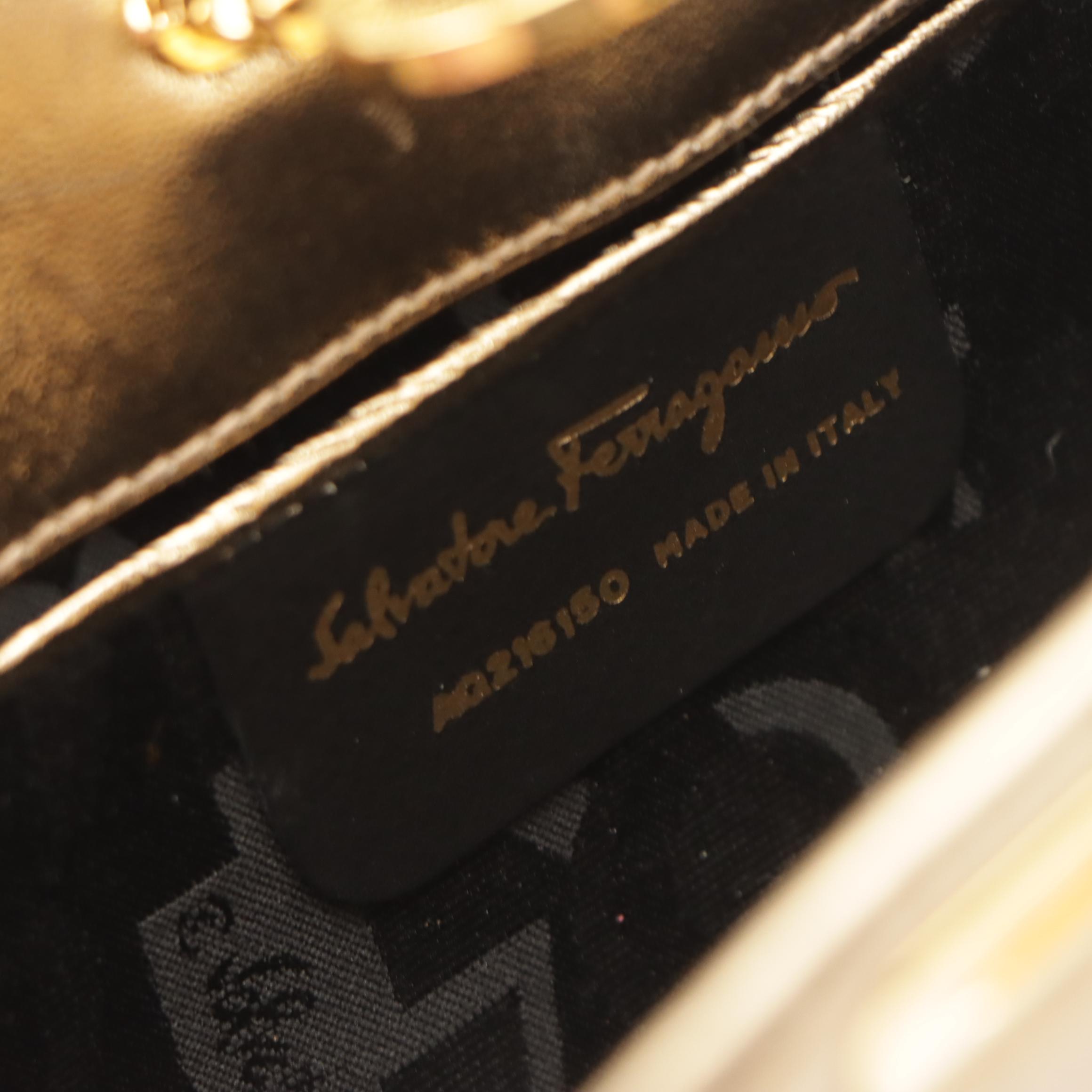 Salvatore Ferragamo Gancini-Lock Clutch on Chain in Metallic Gold Leather