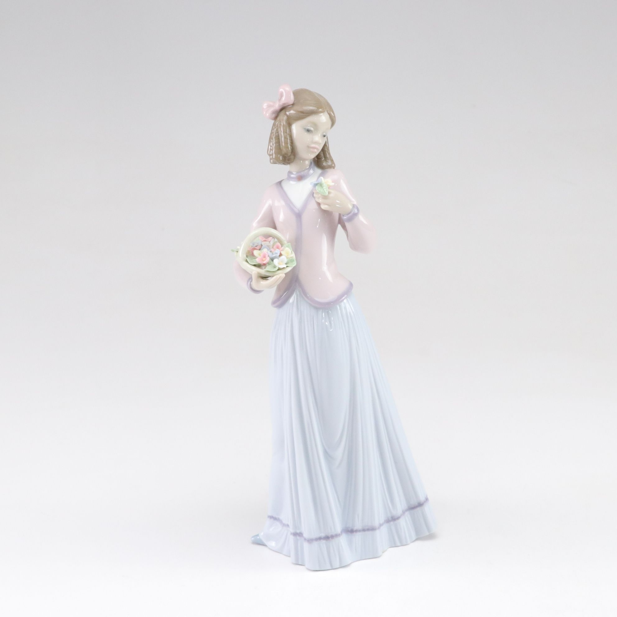 Lladró "Basket of Love" and "Innocence in Bloom" Porcelain Figurines, 1990s