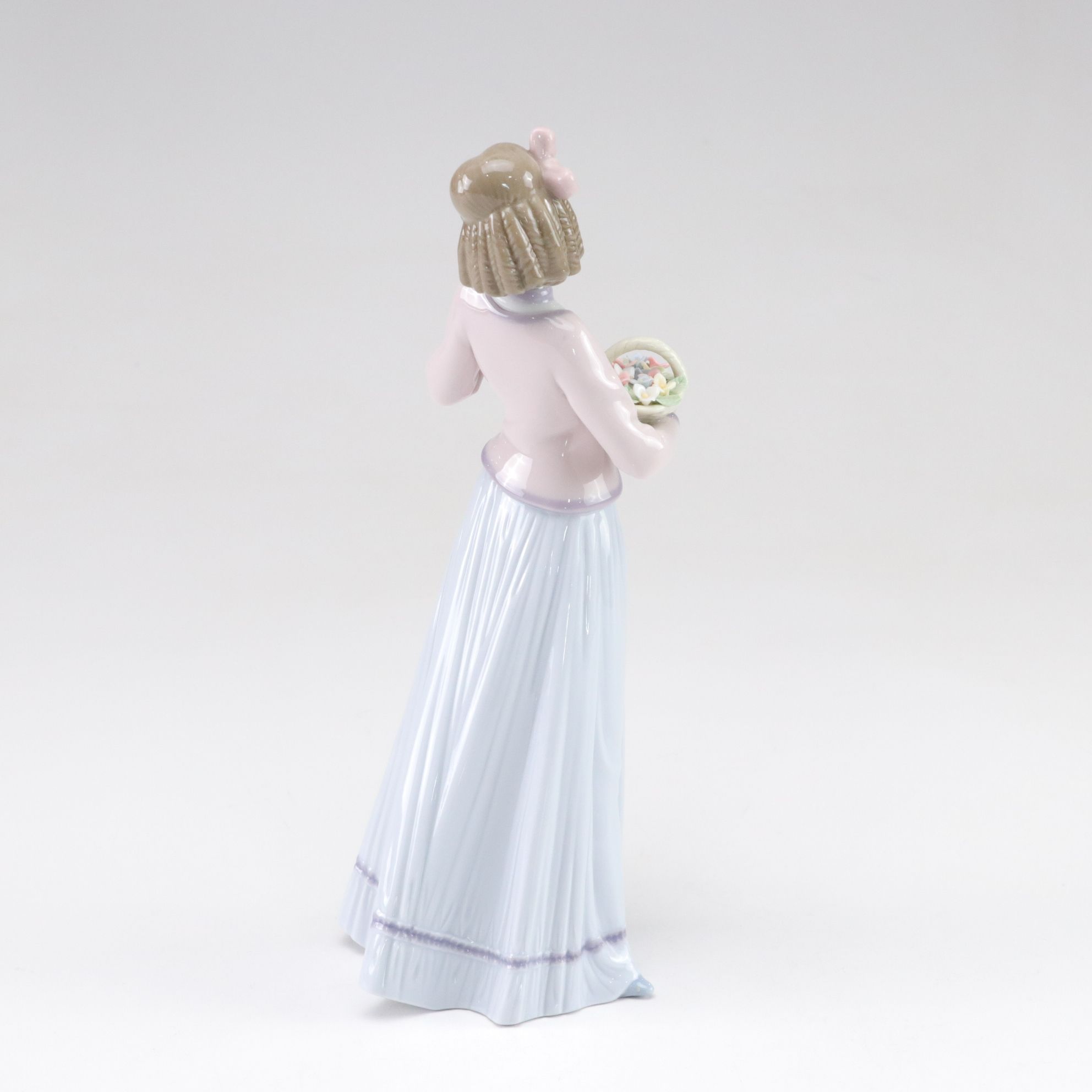 Lladró "Basket of Love" and "Innocence in Bloom" Porcelain Figurines, 1990s