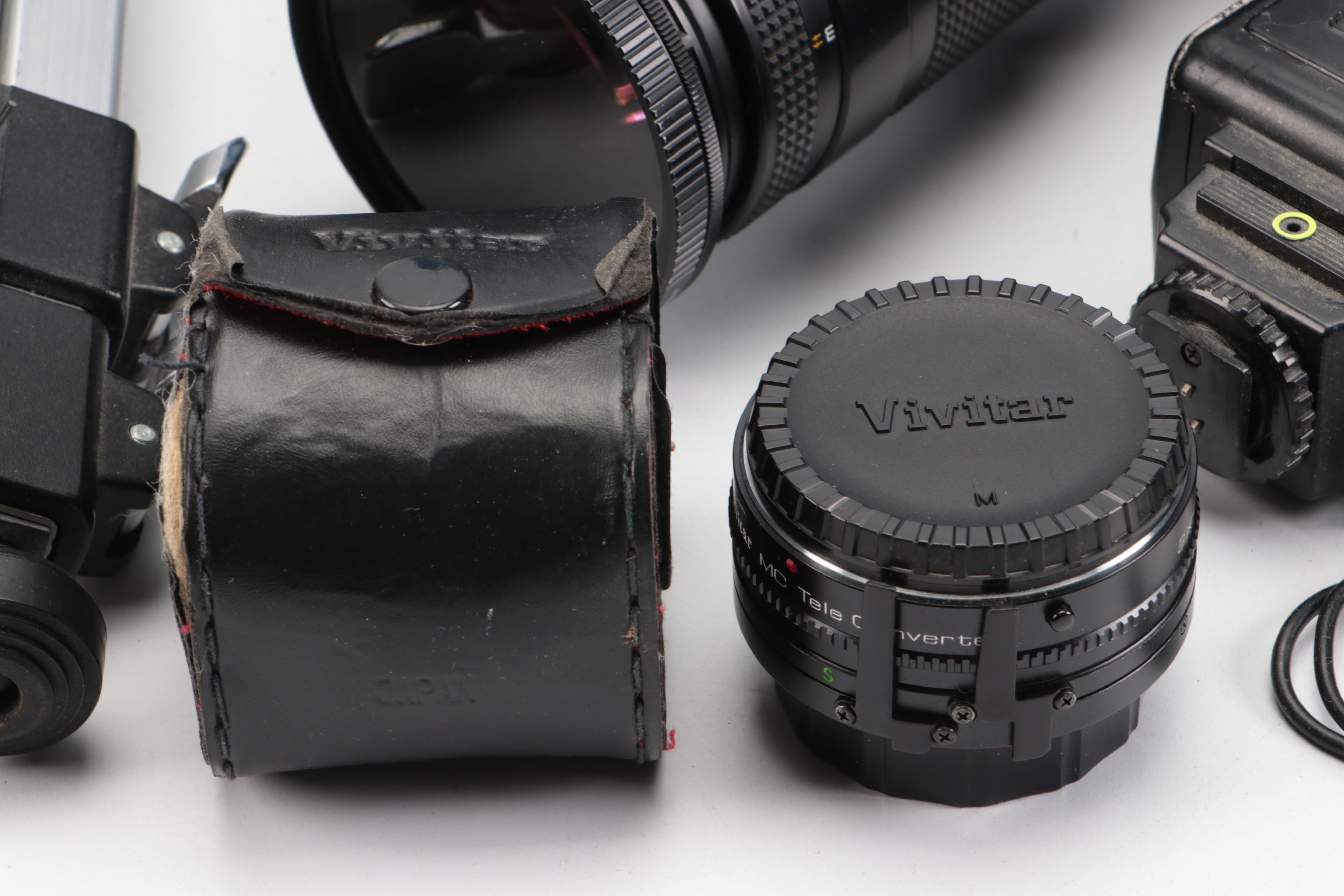 Nikon and Minolta DSLR Cameras with Other Camera Accessories