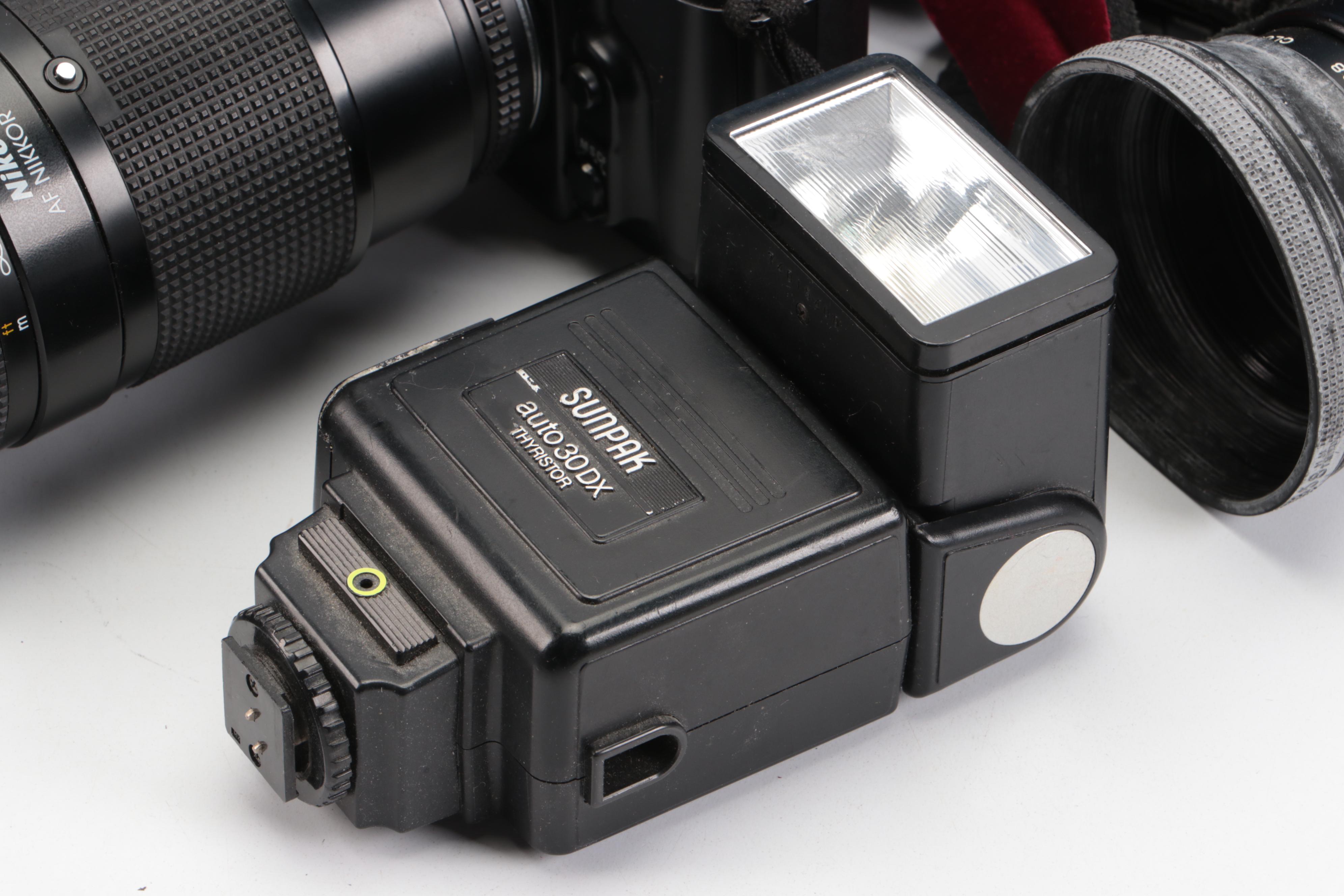 Nikon and Minolta DSLR Cameras with Other Camera Accessories