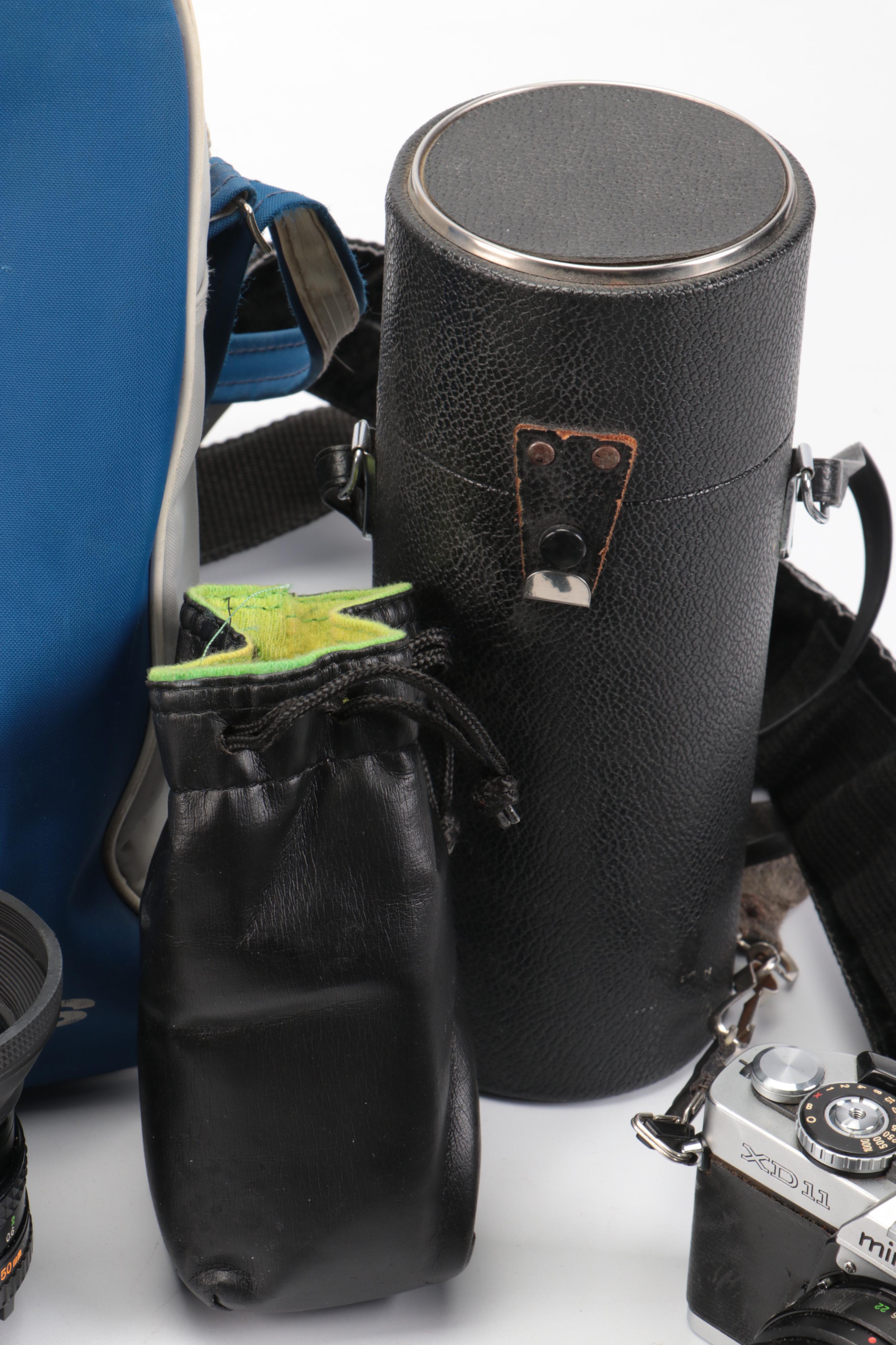 Nikon and Minolta DSLR Cameras with Other Camera Accessories