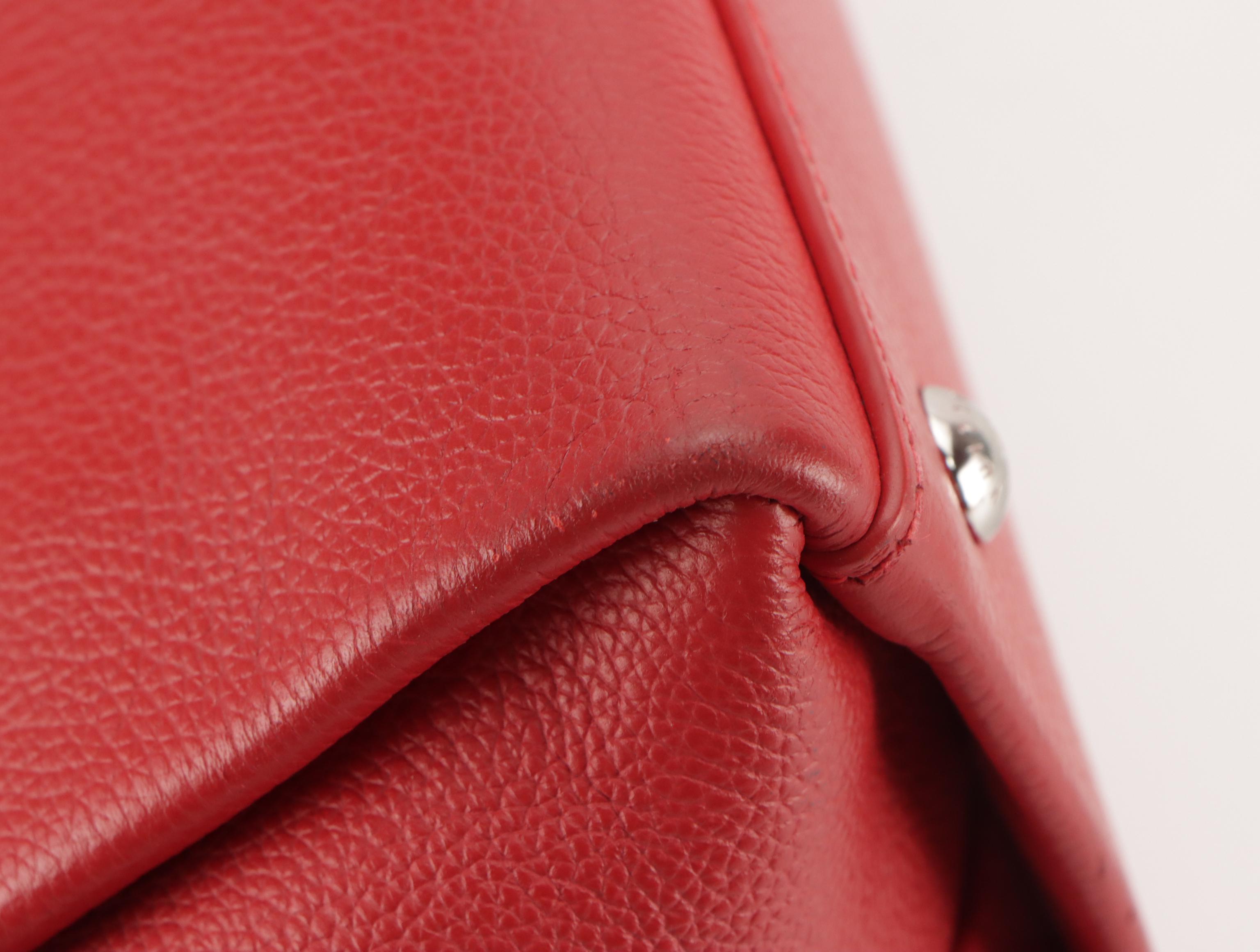 Louis Vuitton Lockmeto Two-Way Bag in Rubis Pebble Grained Leather