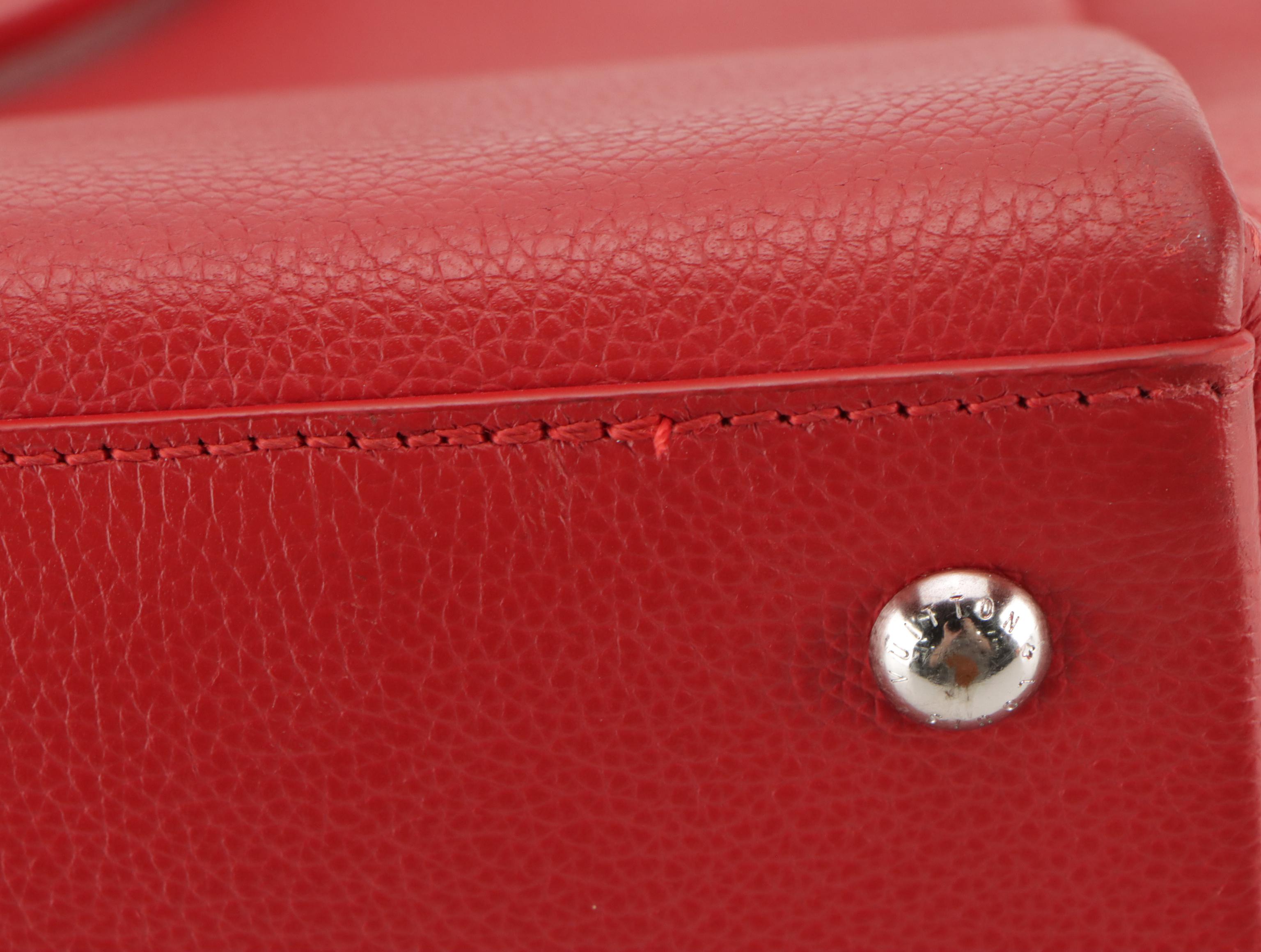 Louis Vuitton Lockmeto Two-Way Bag in Rubis Pebble Grained Leather