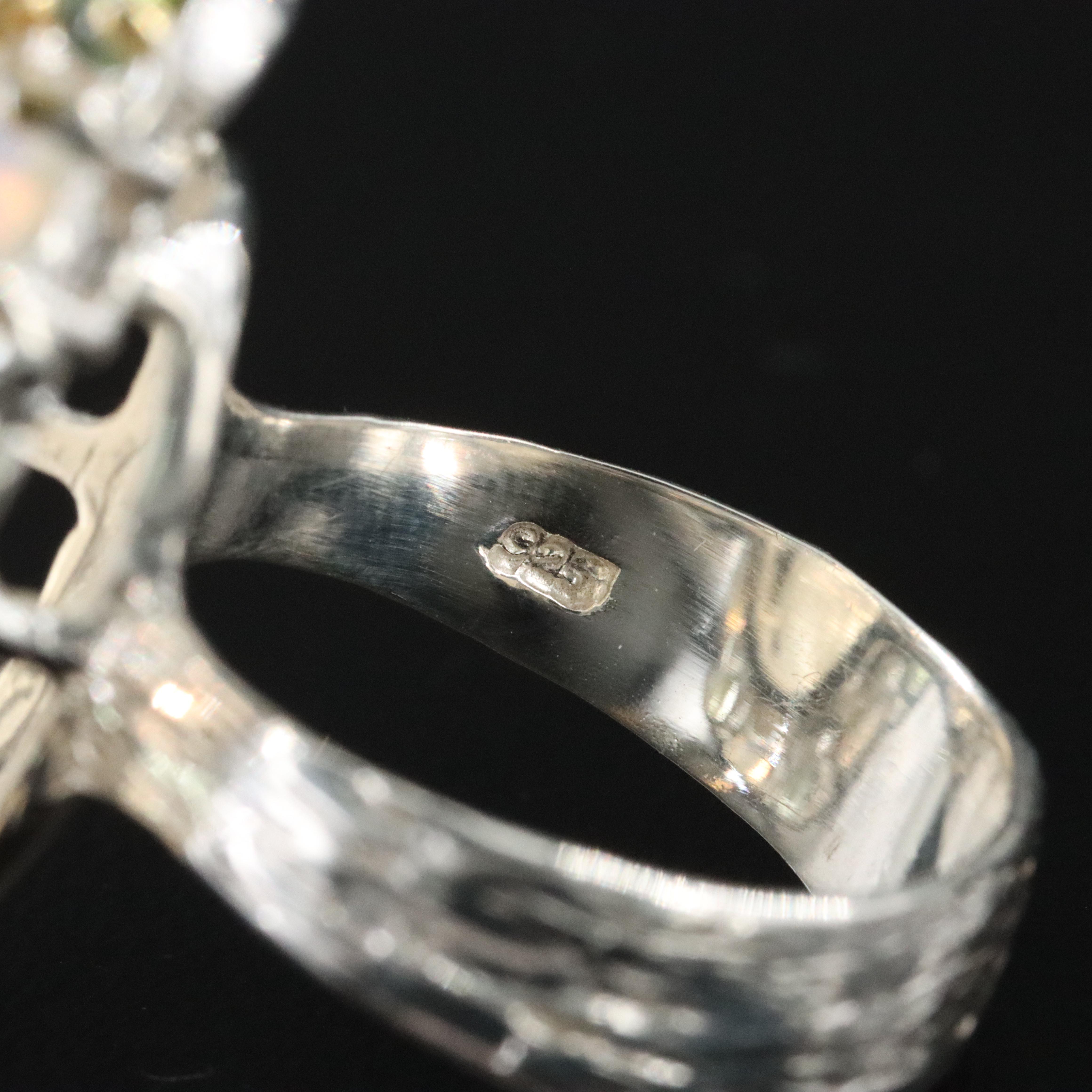 Sterling Gemstone Ring with a Rainbow Moonstone Center