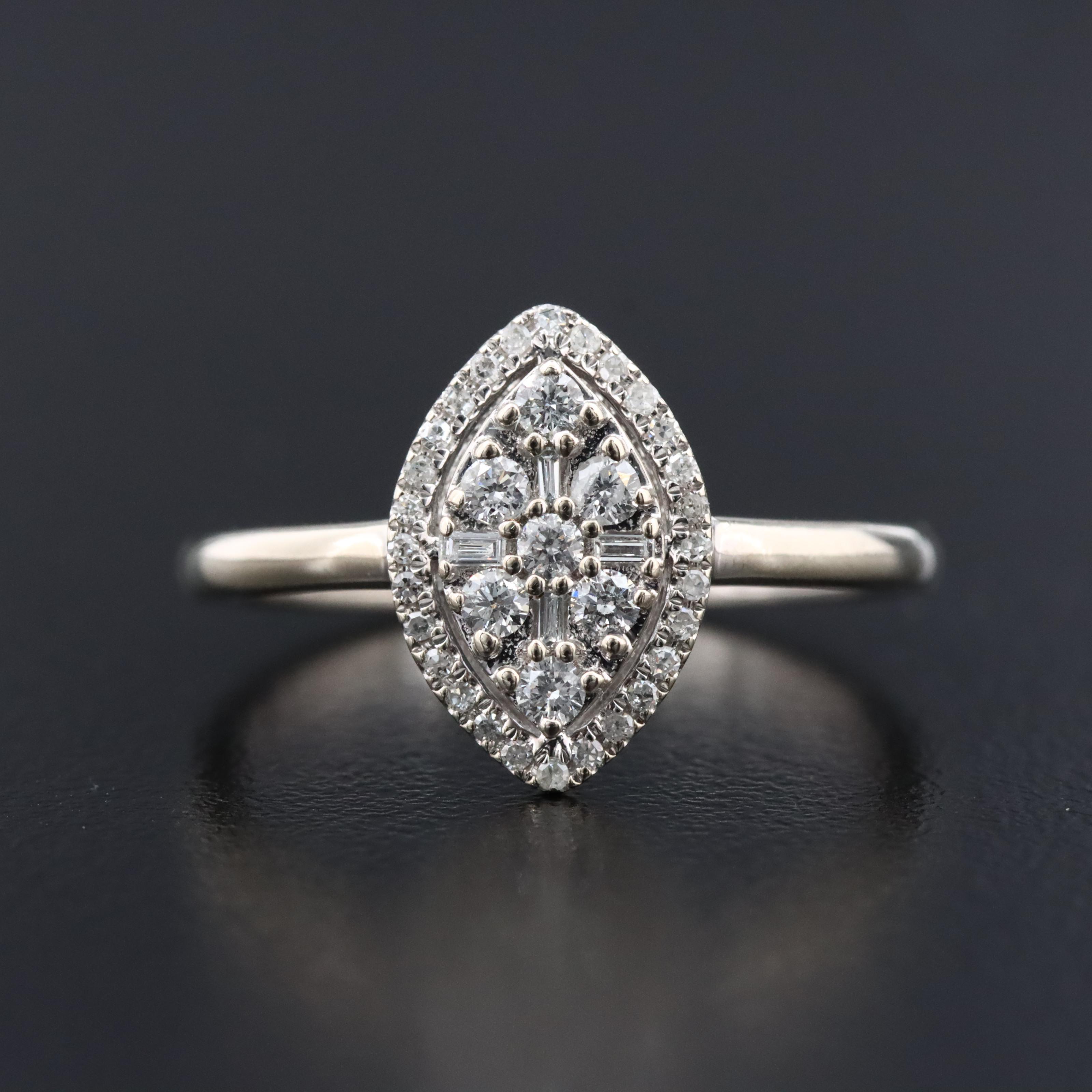 10K 0.25 CTW Diamond Navette Ring