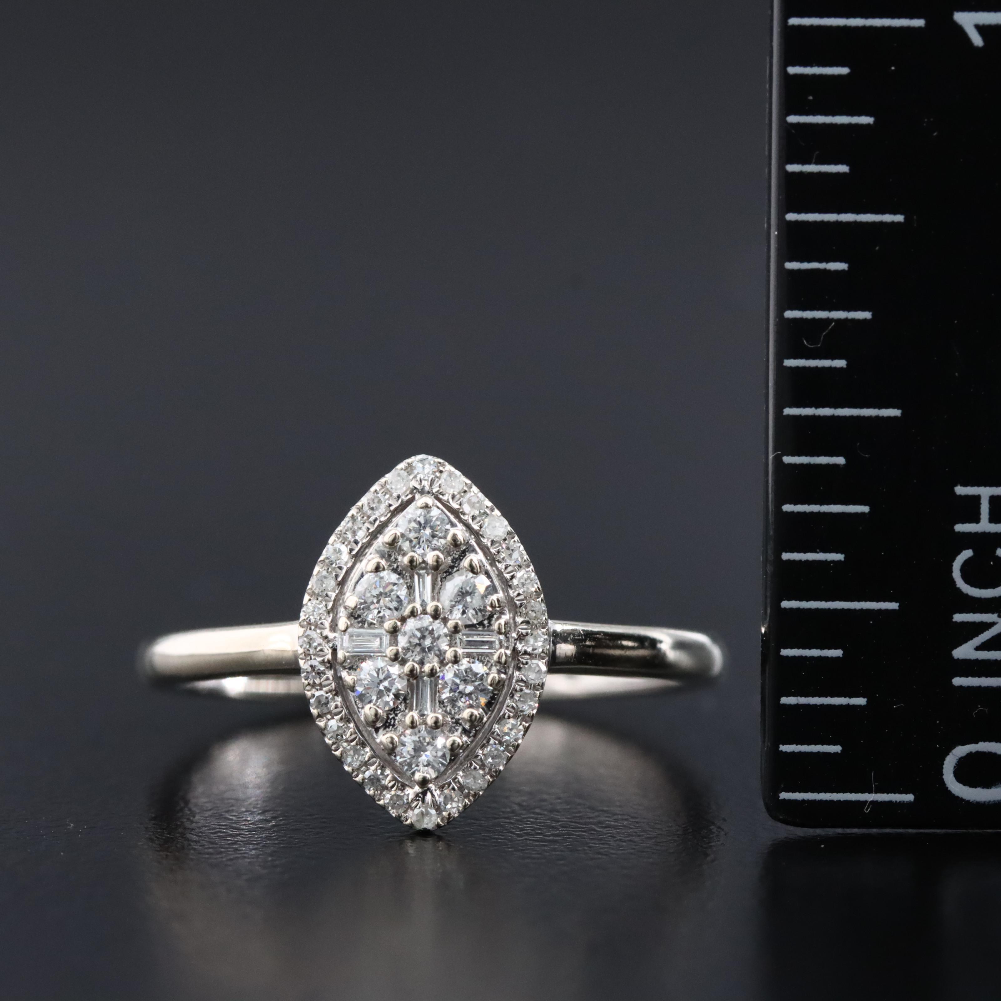 10K 0.25 CTW Diamond Navette Ring
