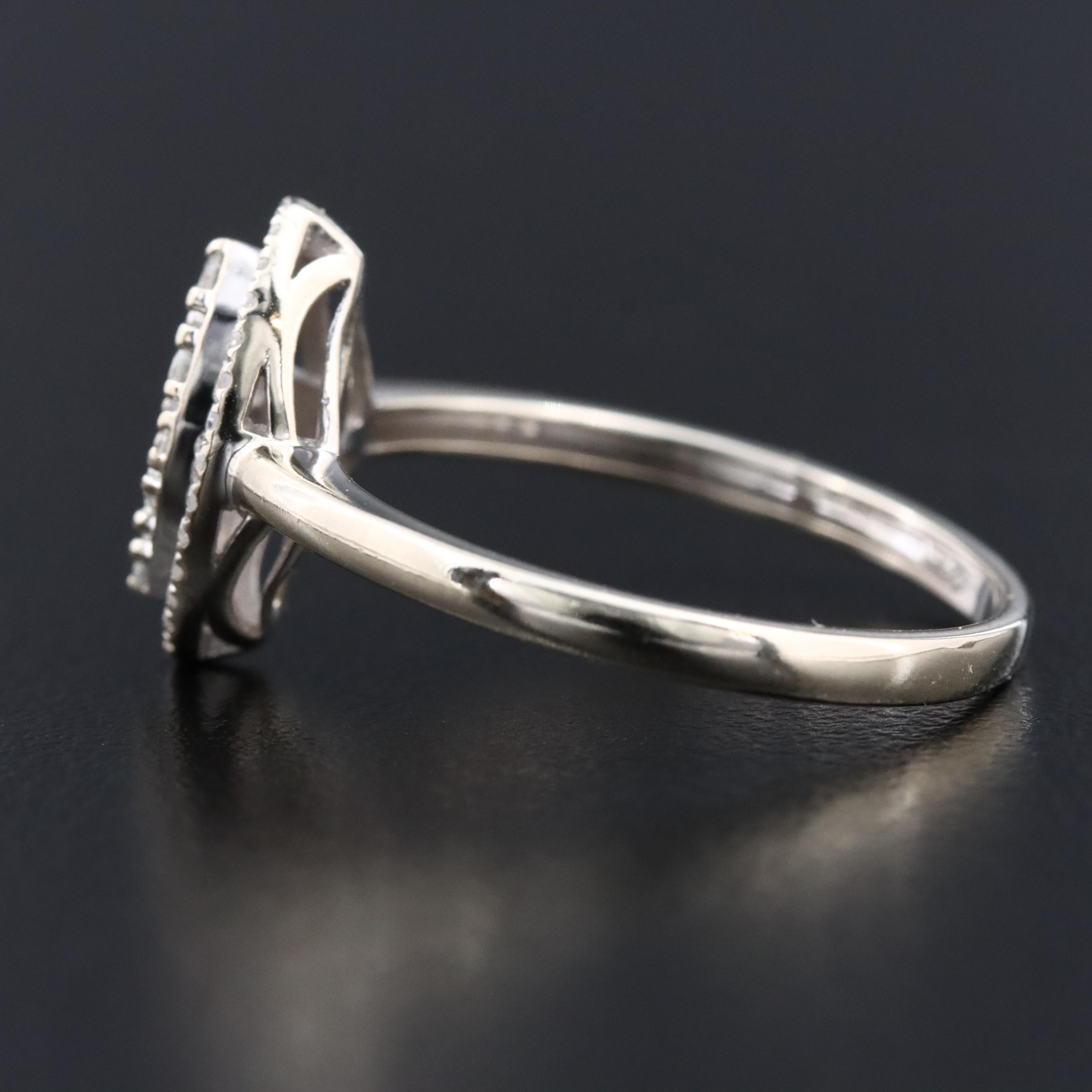 10K 0.25 CTW Diamond Navette Ring