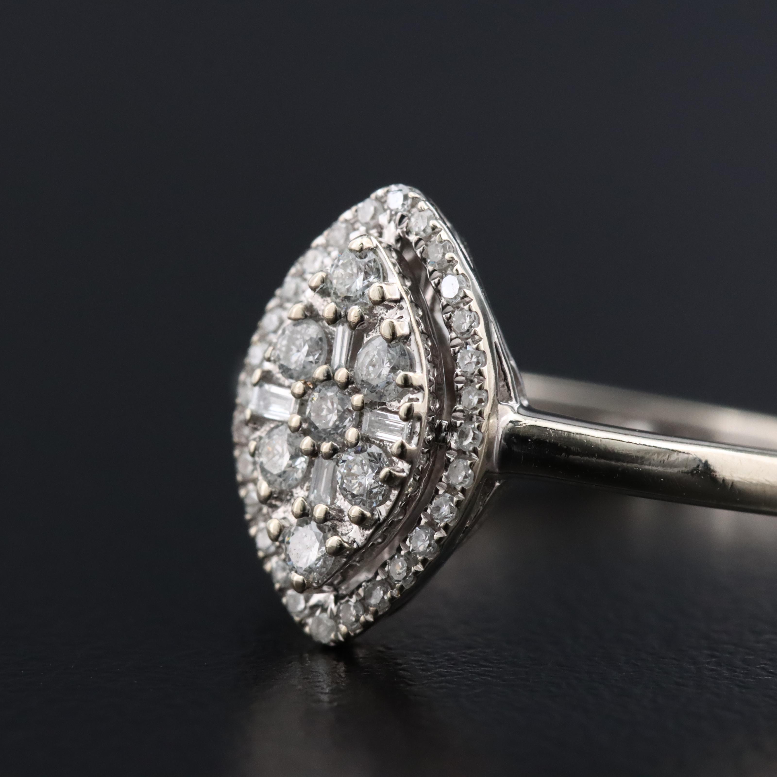 10K 0.25 CTW Diamond Navette Ring