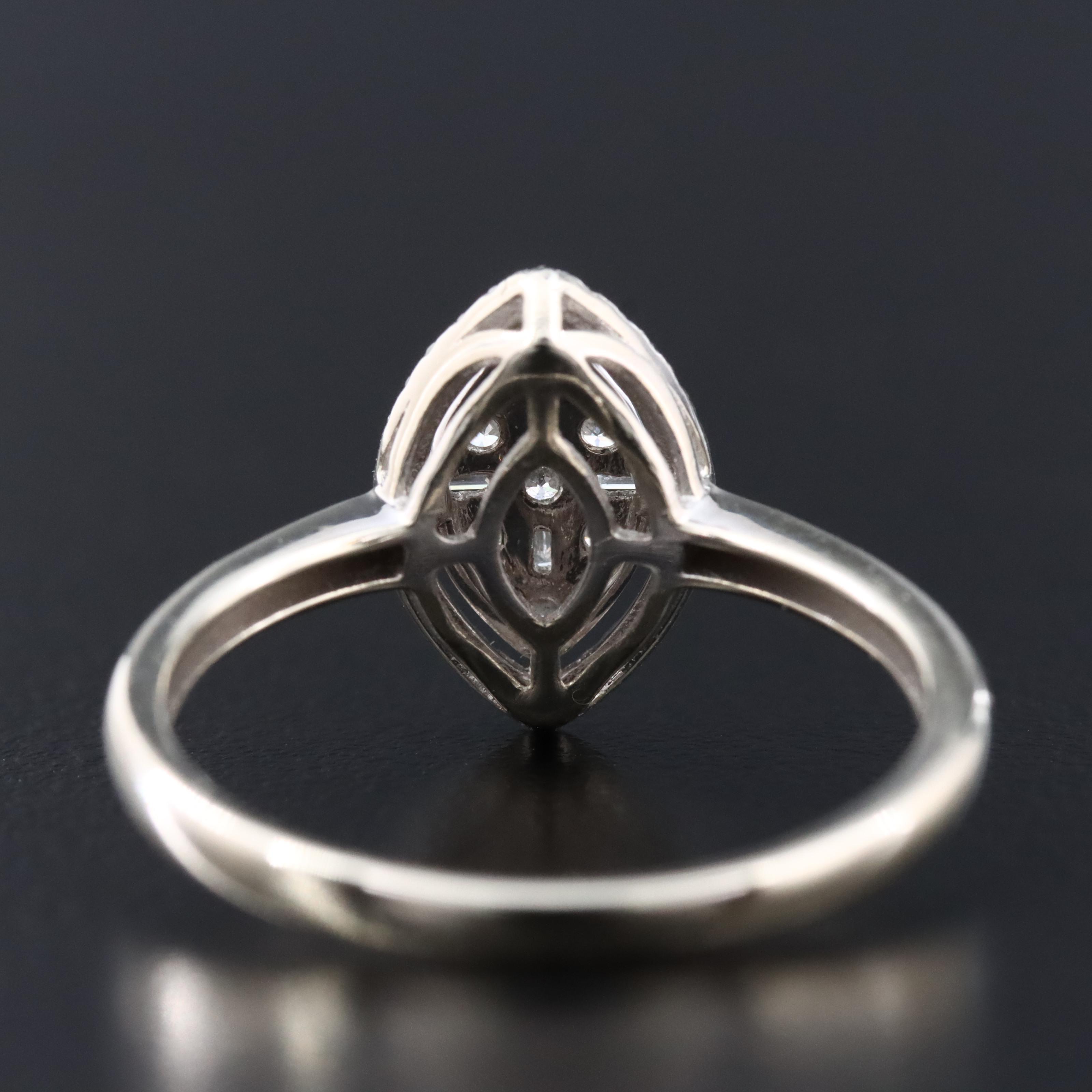 10K 0.25 CTW Diamond Navette Ring