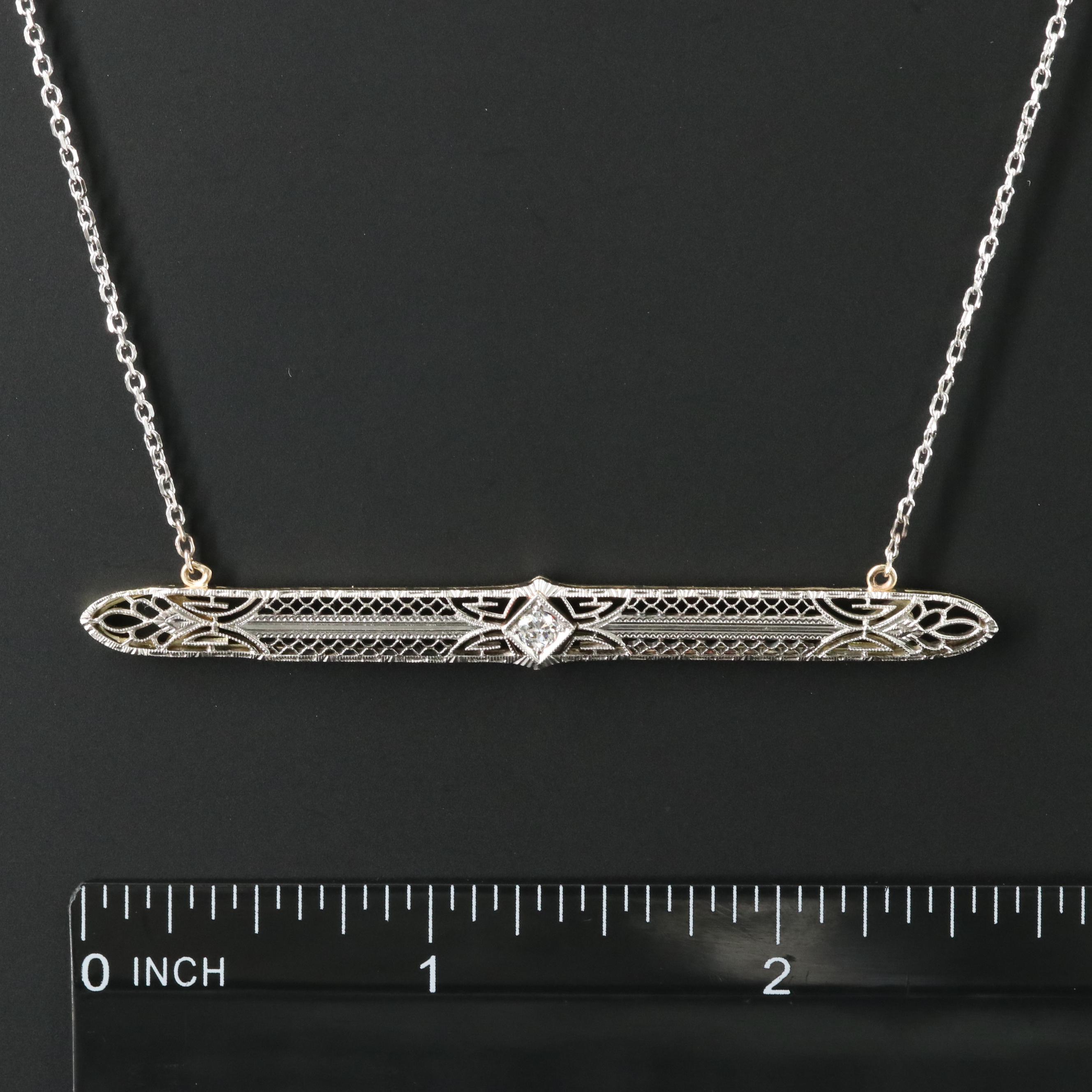 Platinum and 14K 0.10 CT Diamond Necklace