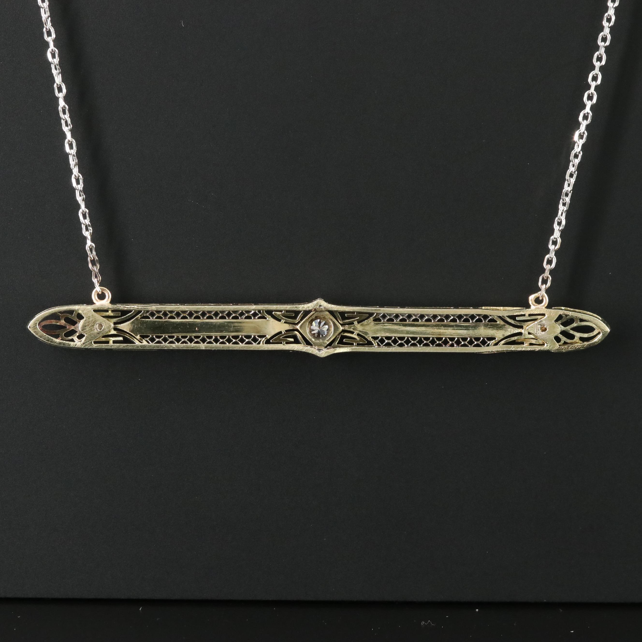 Platinum and 14K 0.10 CT Diamond Necklace