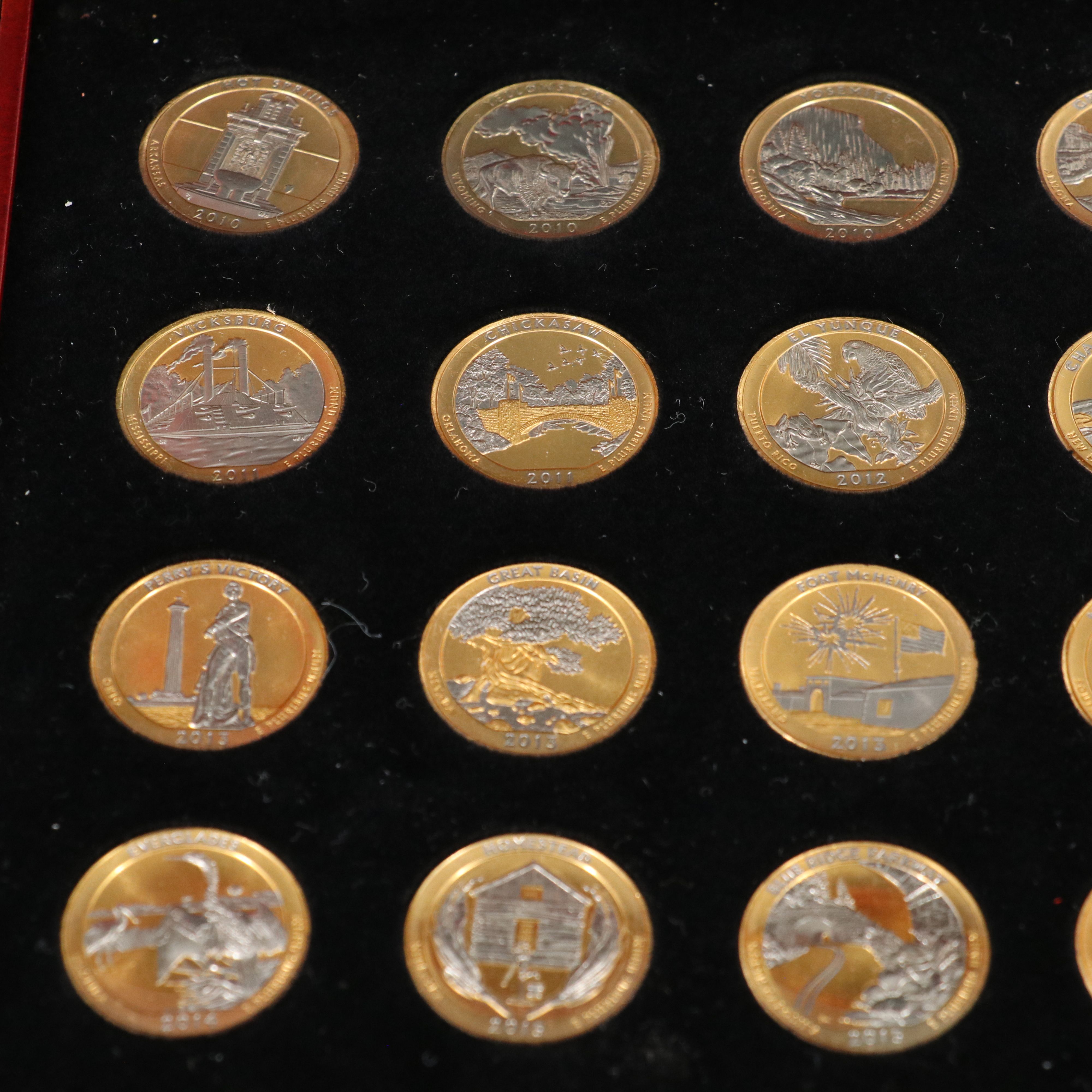 Set of Fifty-Four Different State Quarters Gold Toned and Laminated
