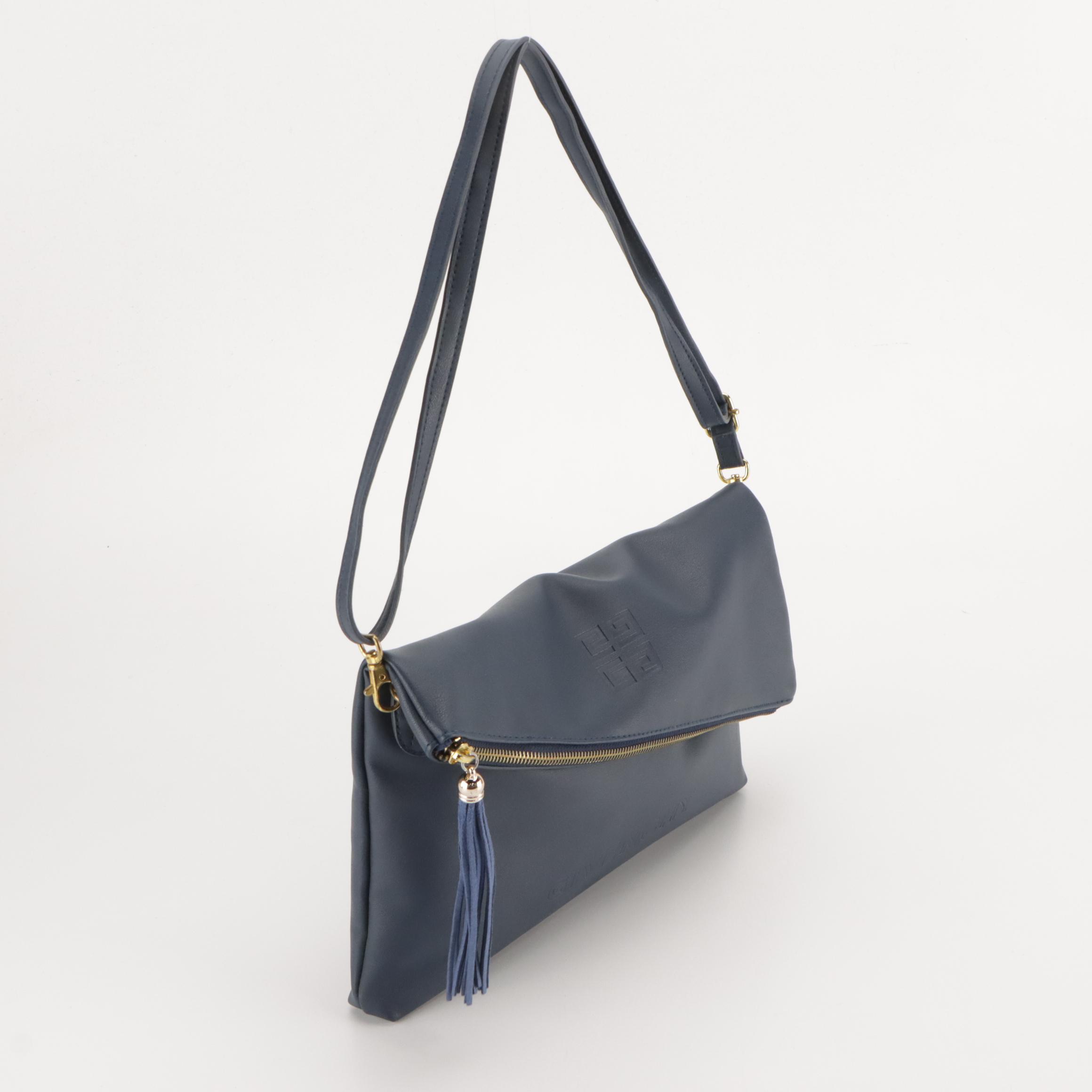 Givenchy Logo Embossed Fold Over Convertible Tassel Bag in Navy Vegan Leather