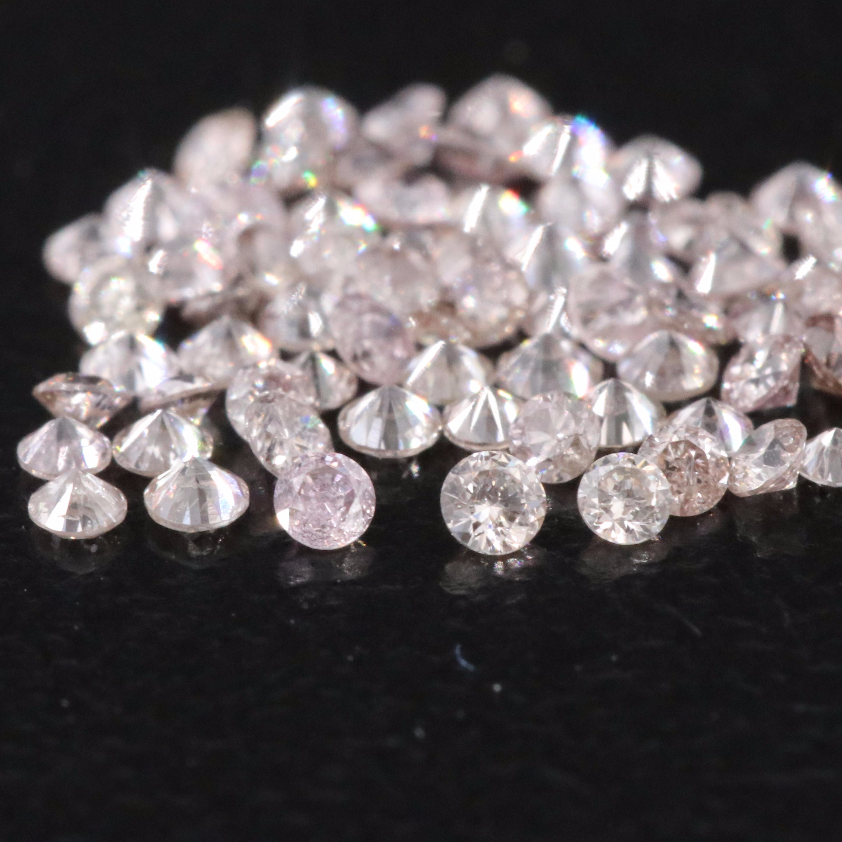 Loose 0.61 CTW Diamond Diamond Lot Featuring Light Pink