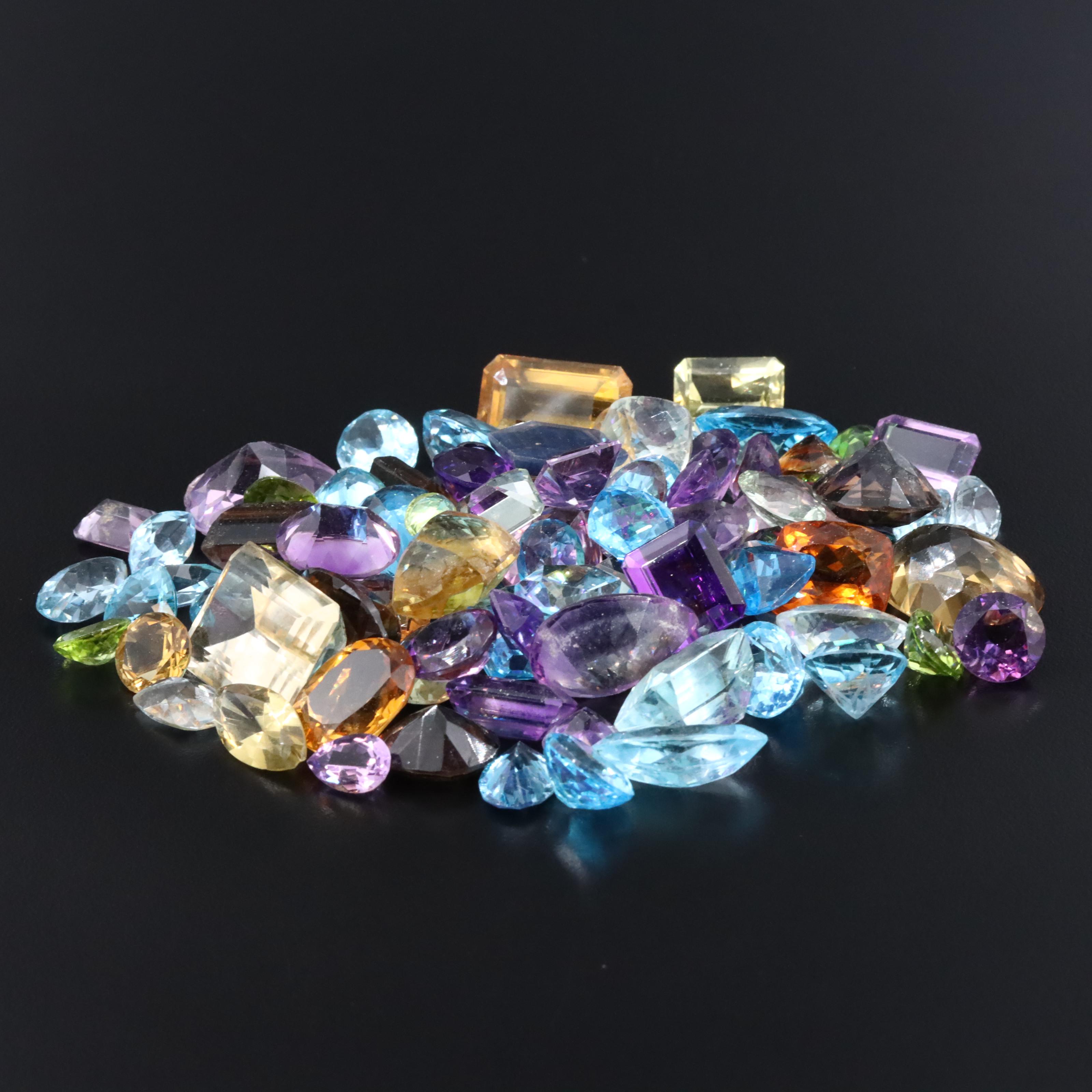 Loose 670.00 CTW Gemstones Featuring Amethyst, Citrine and Topaz