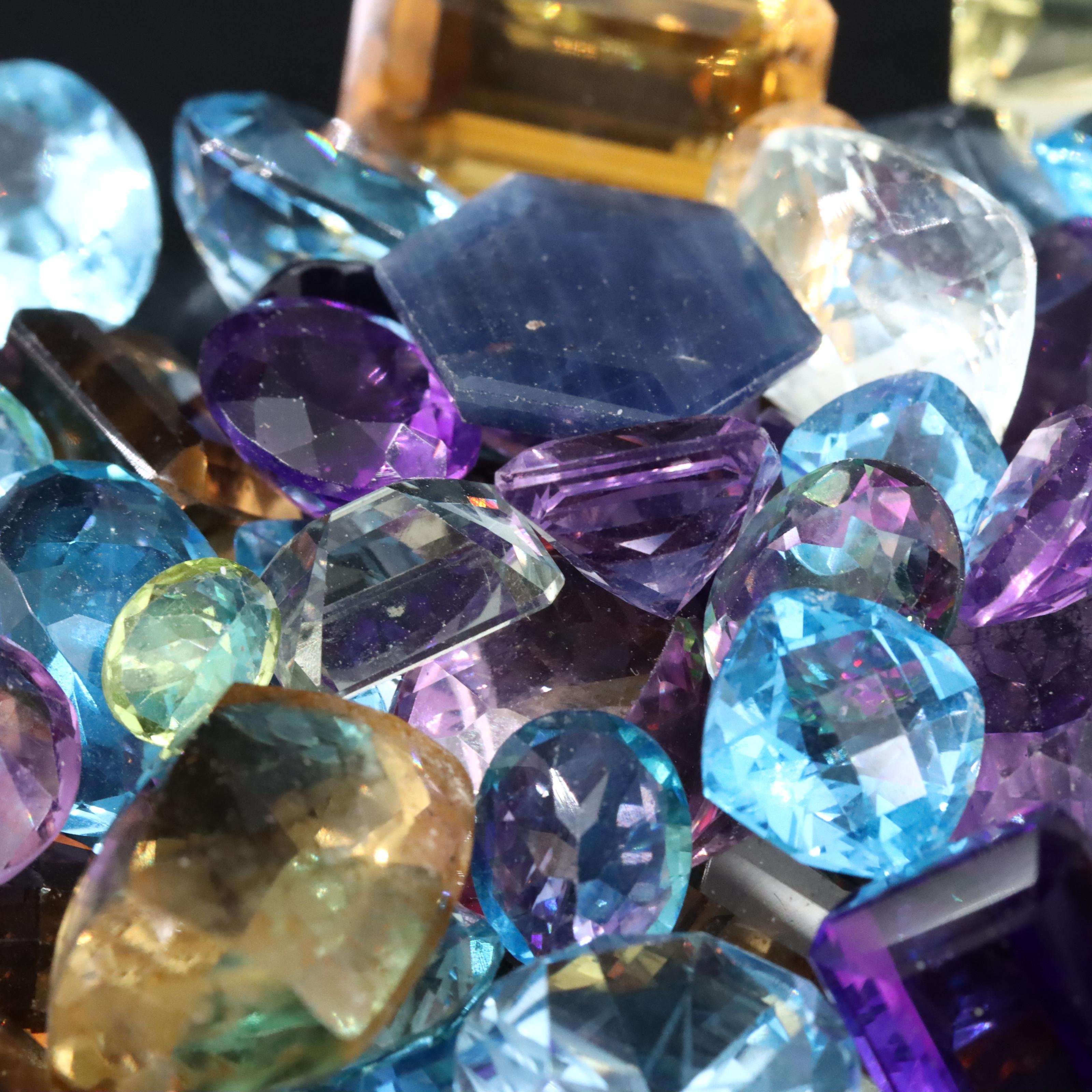 Loose 670.00 CTW Gemstones Featuring Amethyst, Citrine and Topaz