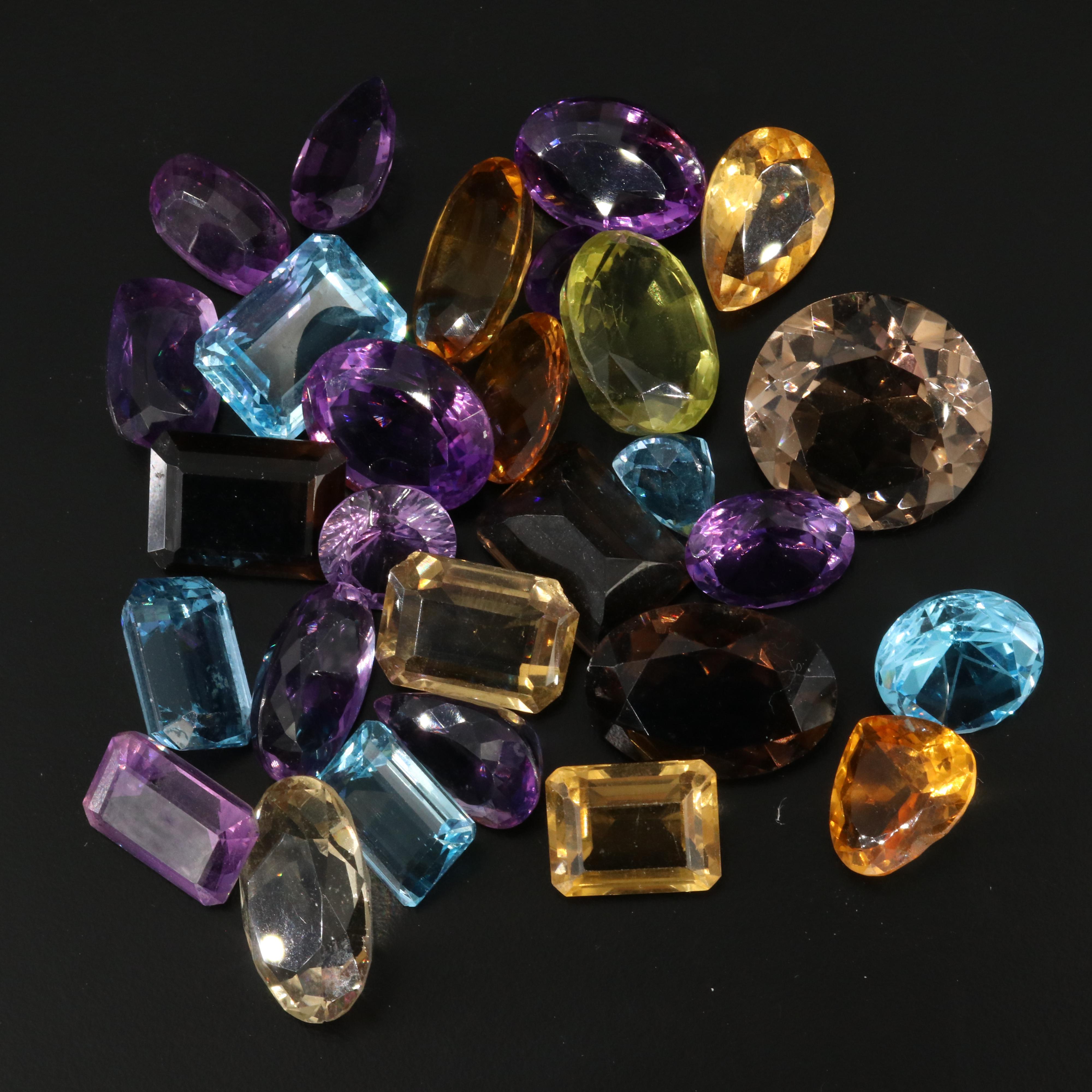 Loose 503.00 CTW Gemstone Lot Including Smoky Quartz, Topaz and Amethyst