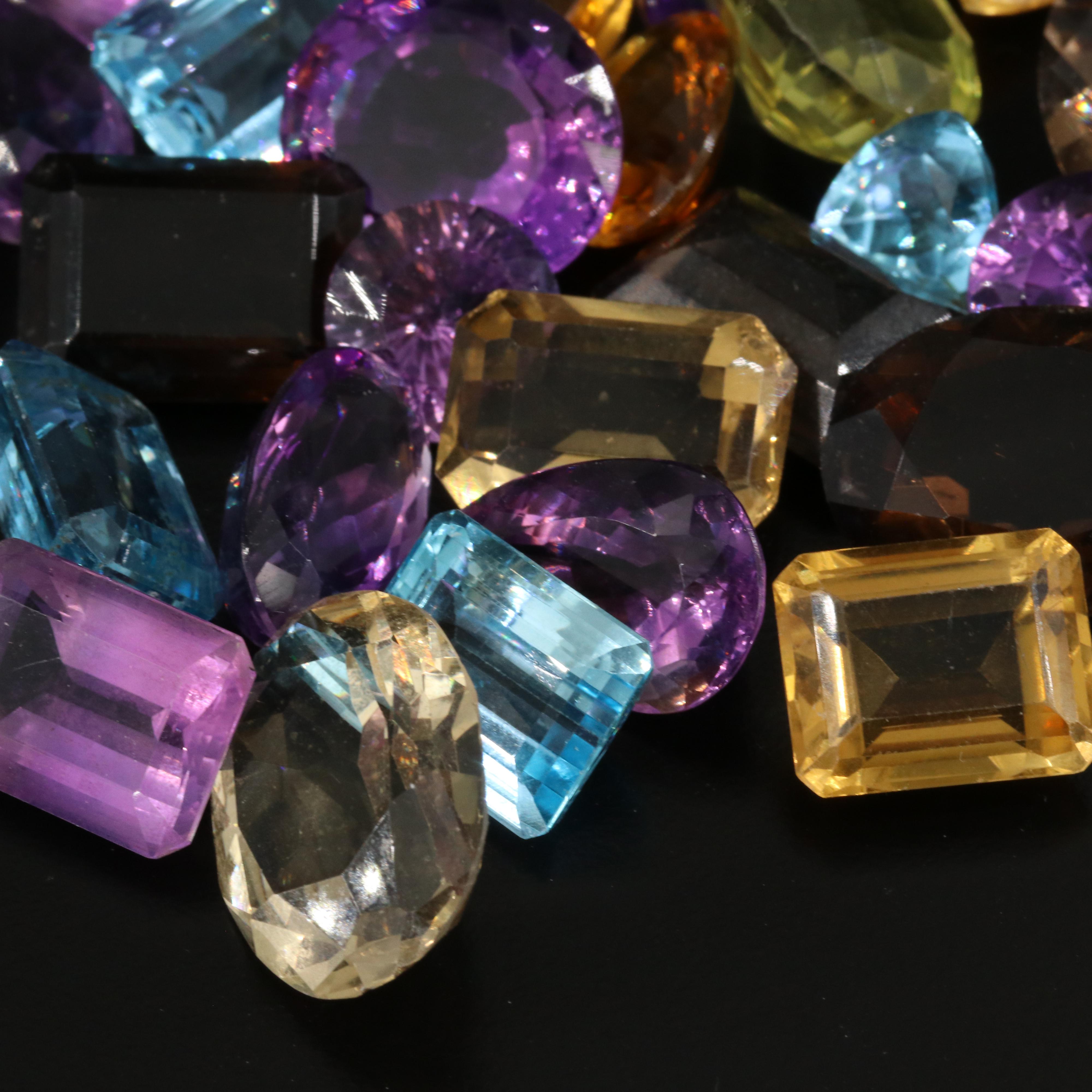 Loose 503.00 CTW Gemstone Lot Including Smoky Quartz, Topaz and Amethyst