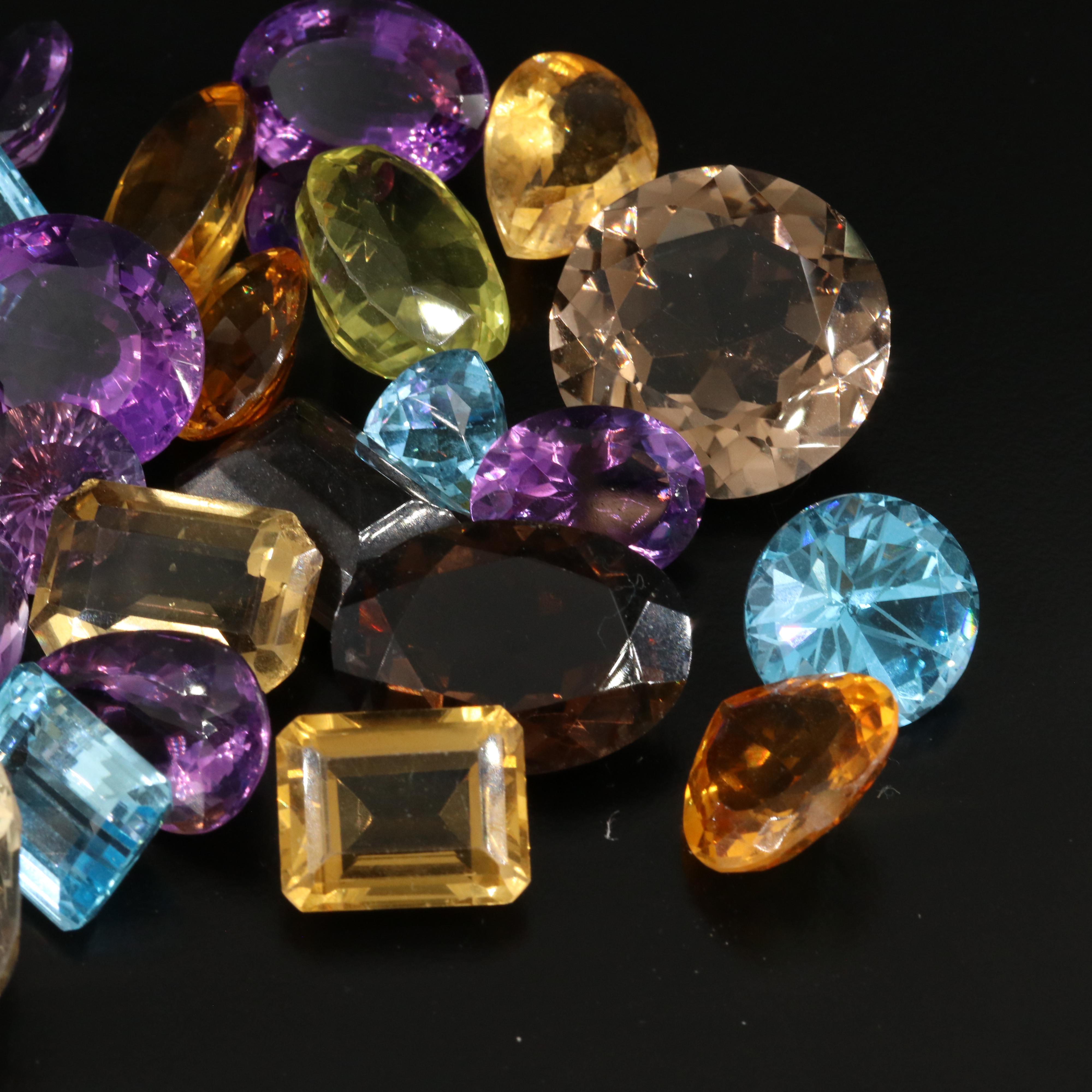 Loose 503.00 CTW Gemstone Lot Including Smoky Quartz, Topaz and Amethyst