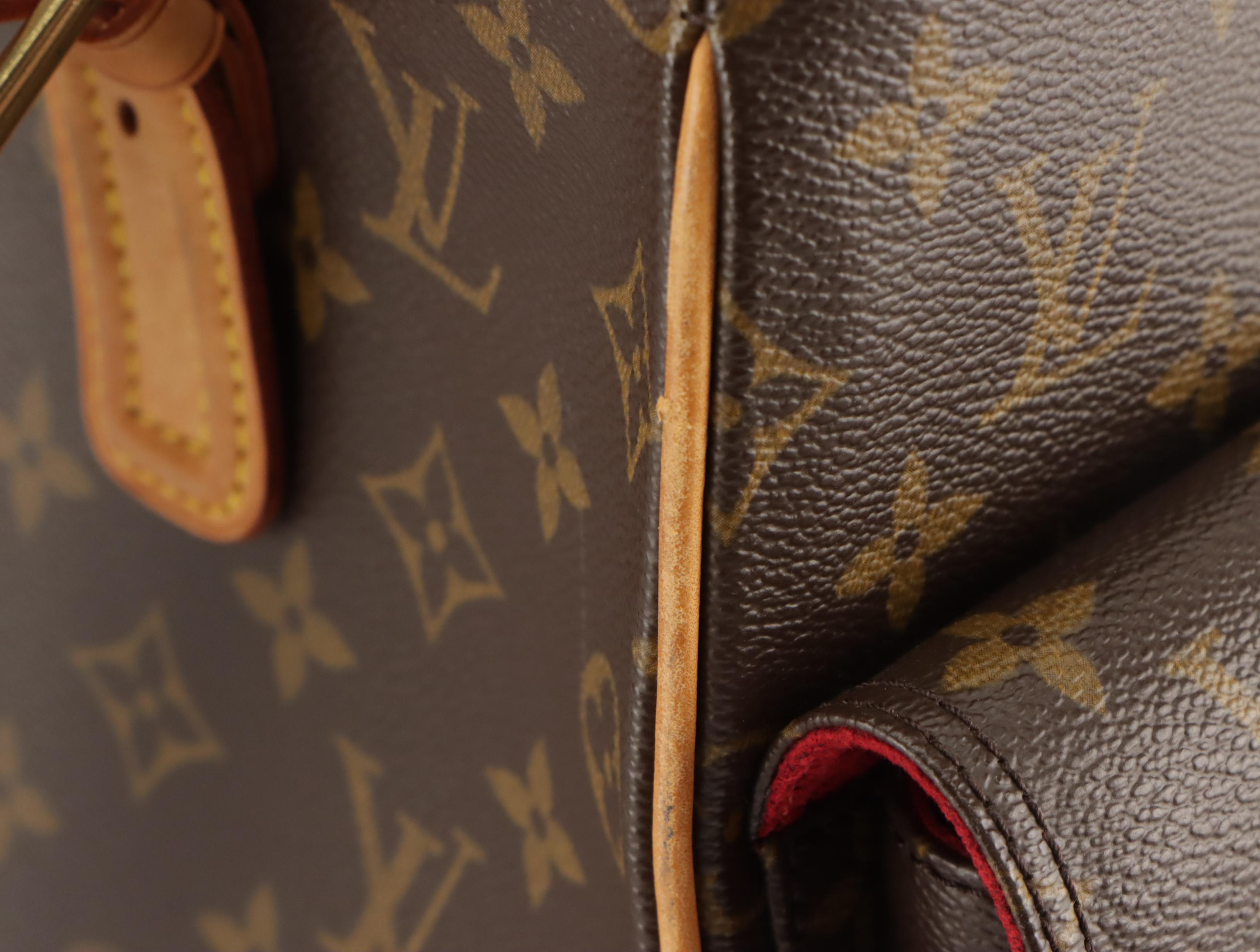 Louis Vuitton Multipli-Cité Shoulder Bag in Monogram Canvas and Vachetta Leather