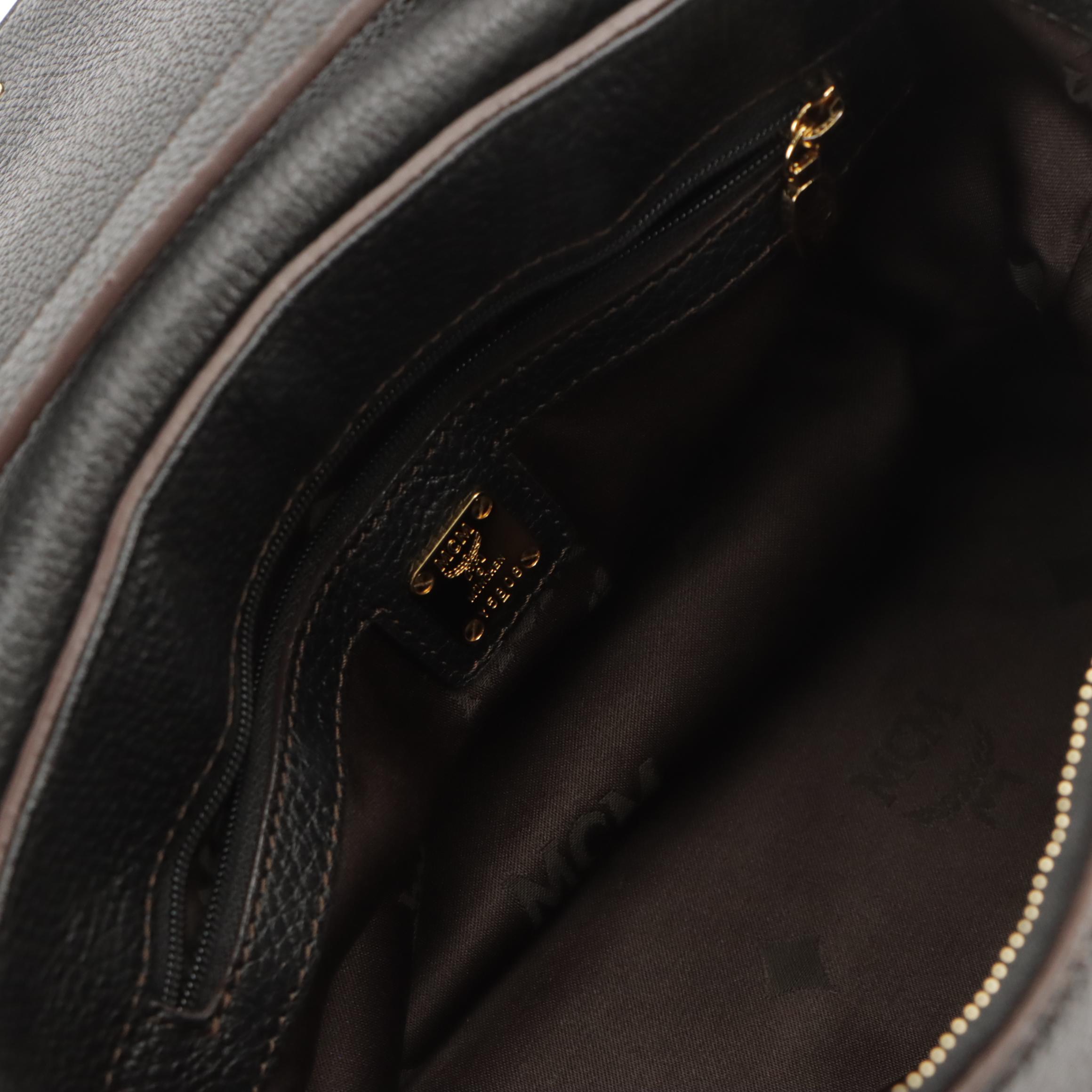 MCM Logo Studs Two-Way Front Flap Bag in Black Grained Leather