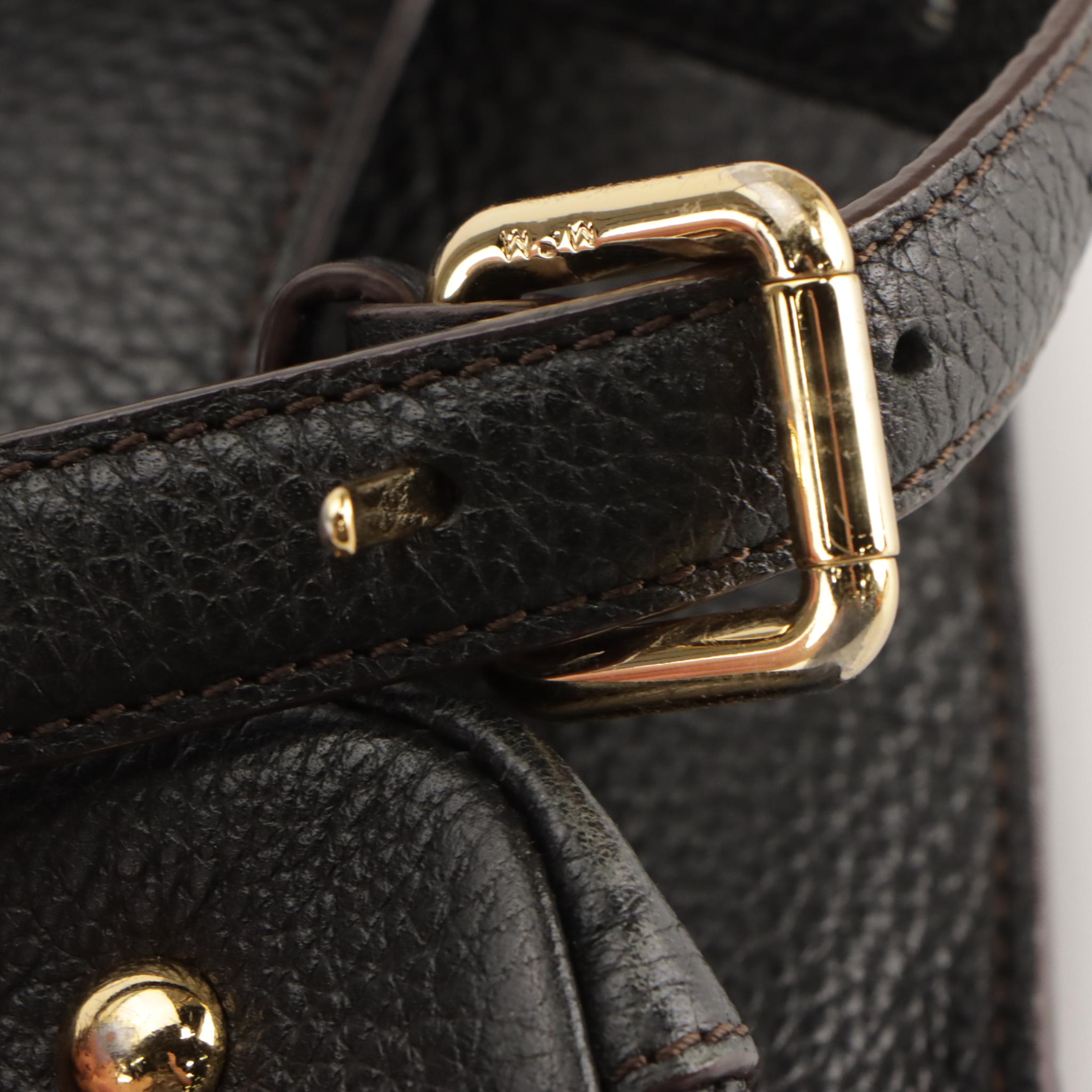 MCM Logo Studs Two-Way Front Flap Bag in Black Grained Leather