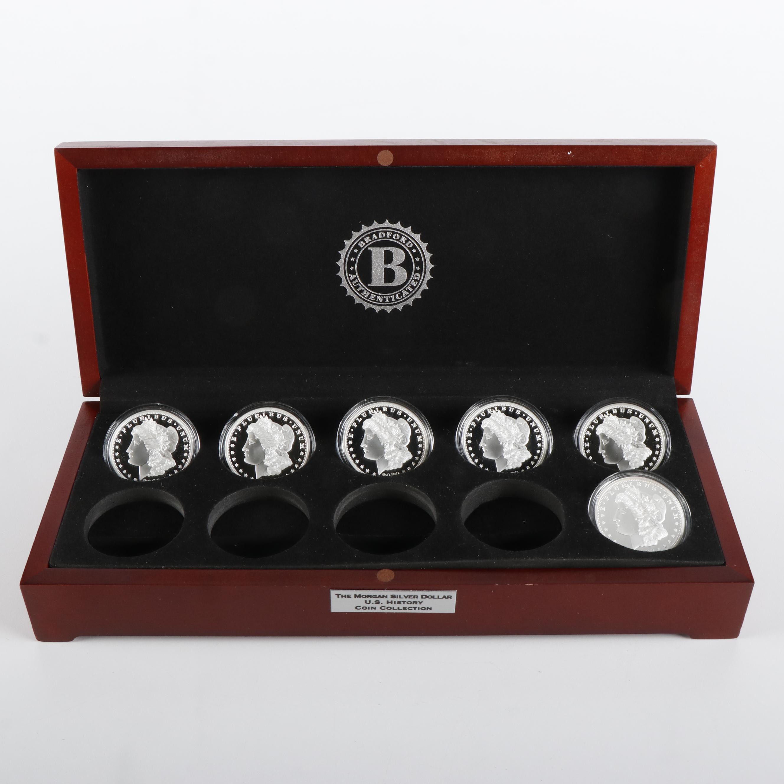 Two Kennedy Legacy Coin Sets and a Morgan Dollar History Set