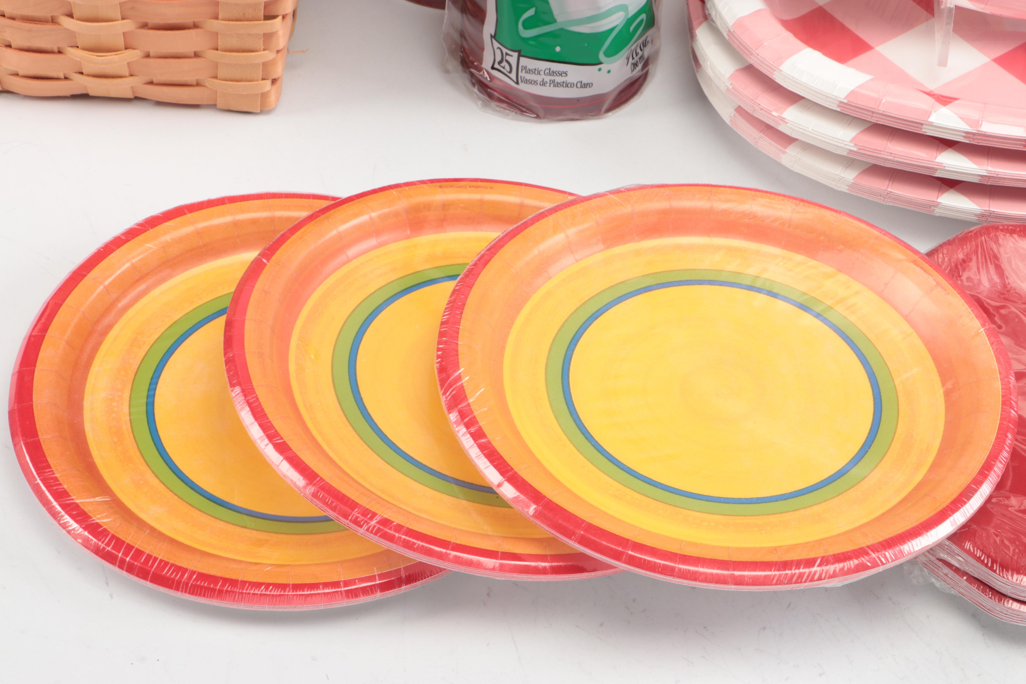Red Plastic Tumblers with Paper Plates and Other Party Supplies
