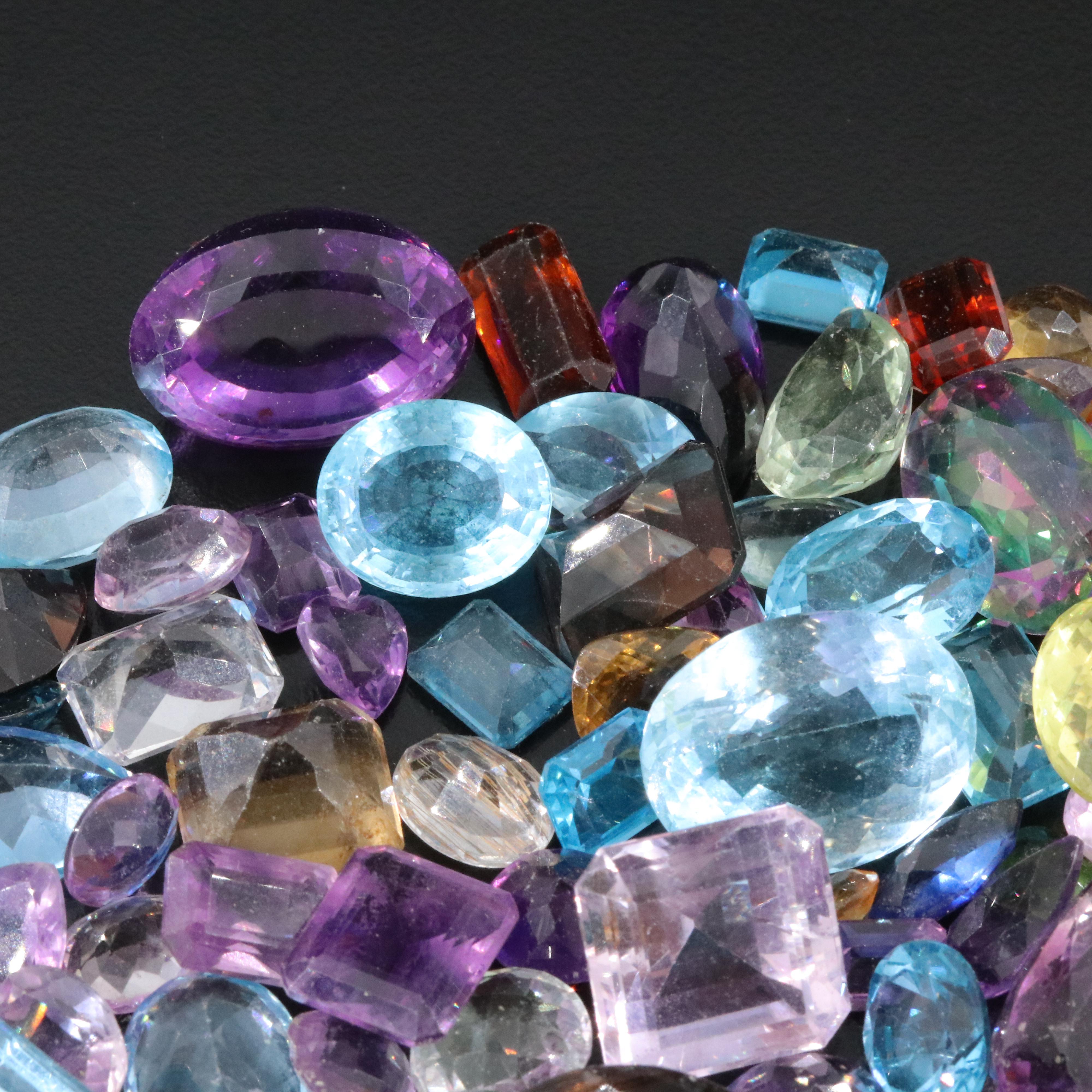 Loose 711.00 CTW Gemstones Featuring Amethyst, Topaz and Citrine