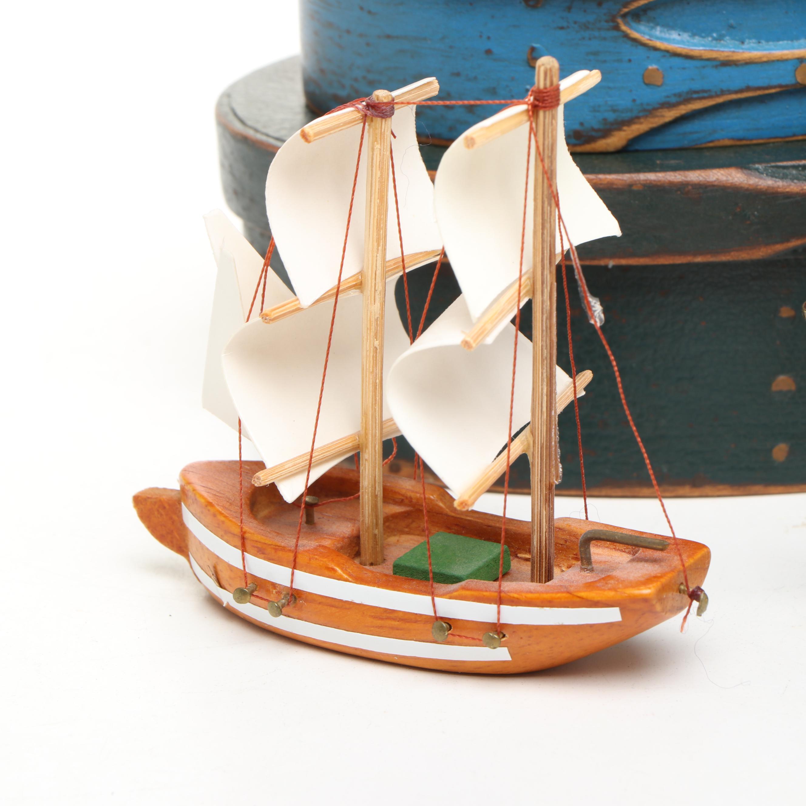 Miniature Brass Candelabras, Miniature Wood Boat, and Painted Wood Boxes