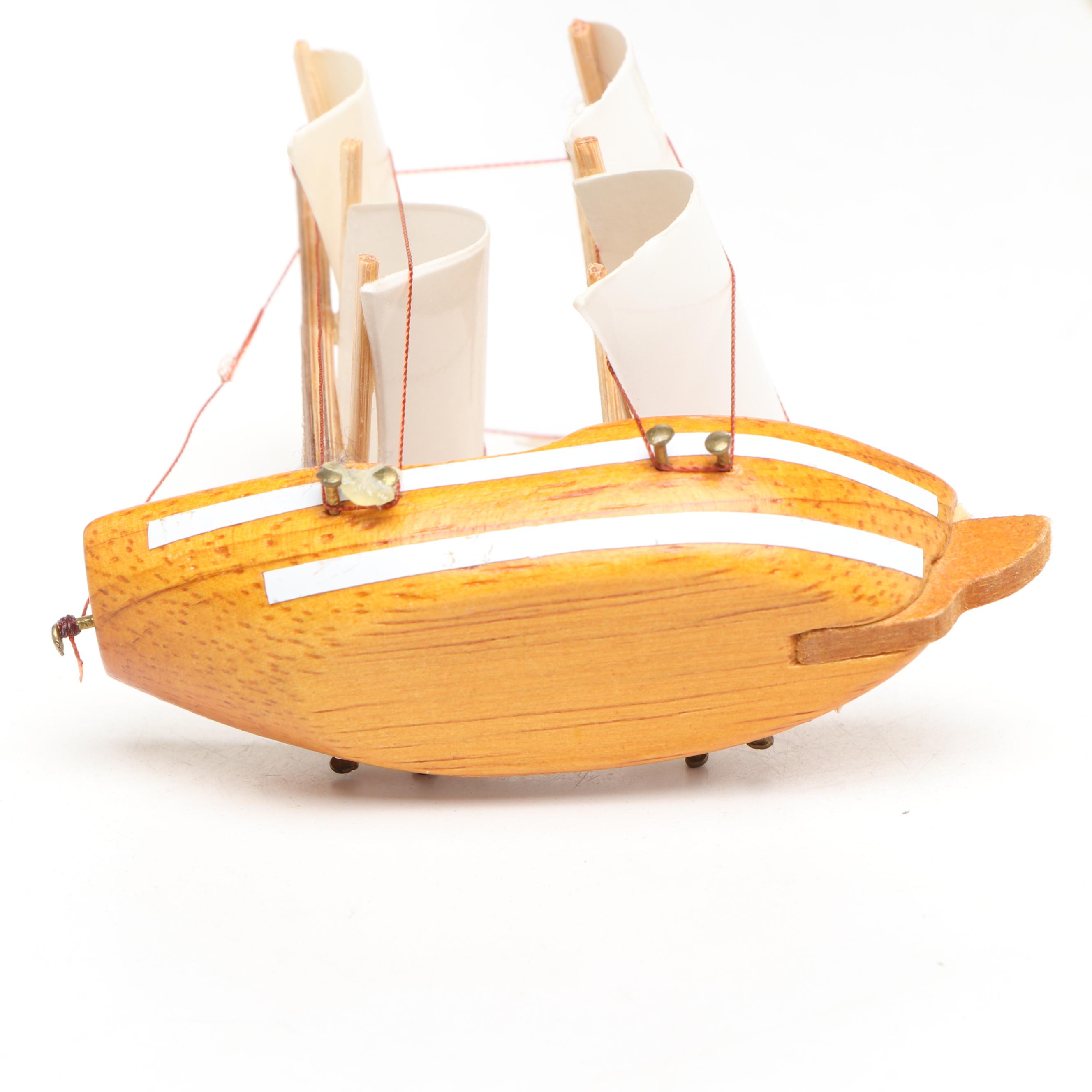 Miniature Brass Candelabras, Miniature Wood Boat, and Painted Wood Boxes