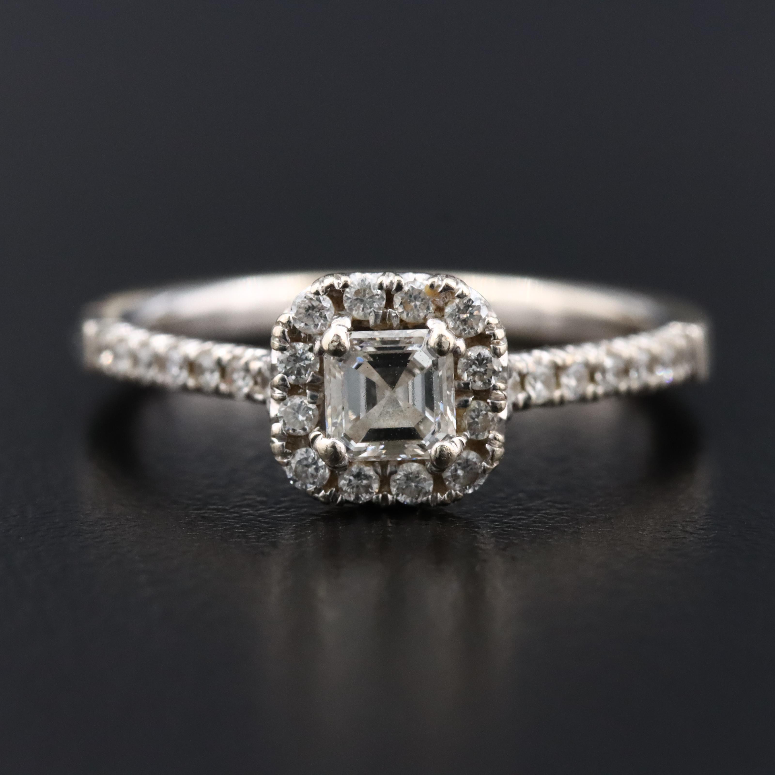 14K 0.66 CTW Diamond Halo Ring