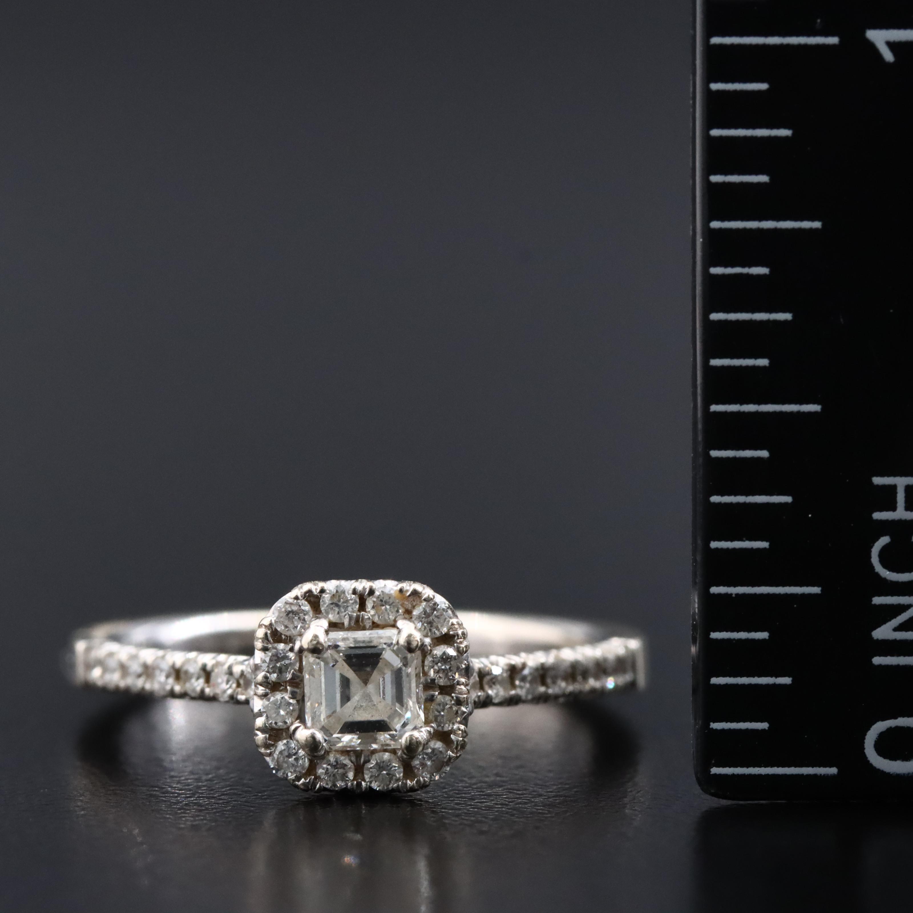 14K 0.66 CTW Diamond Halo Ring