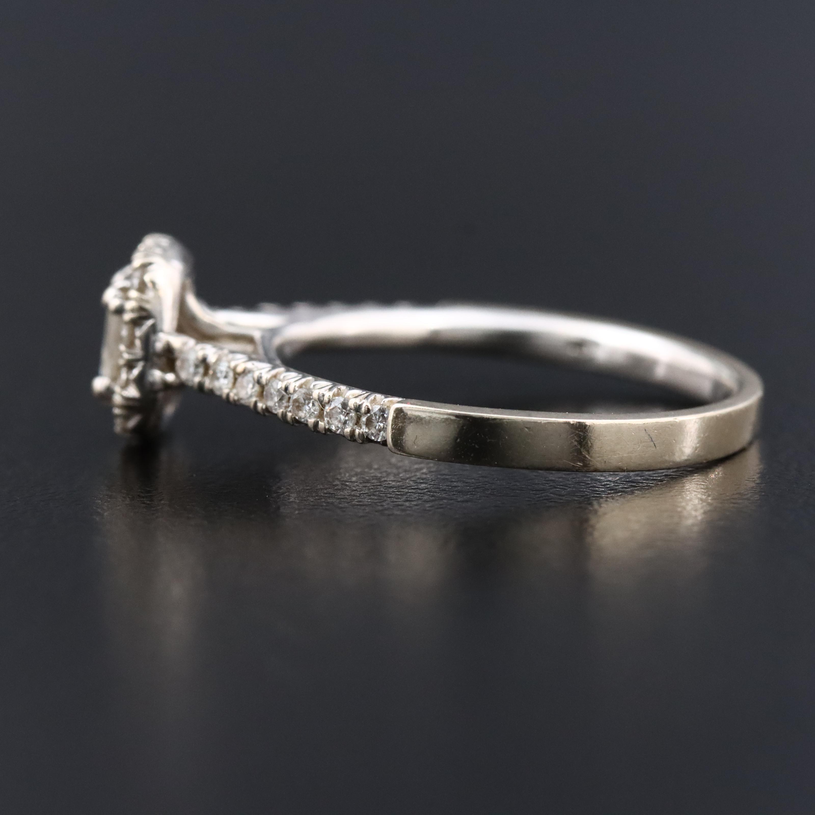 14K 0.66 CTW Diamond Halo Ring