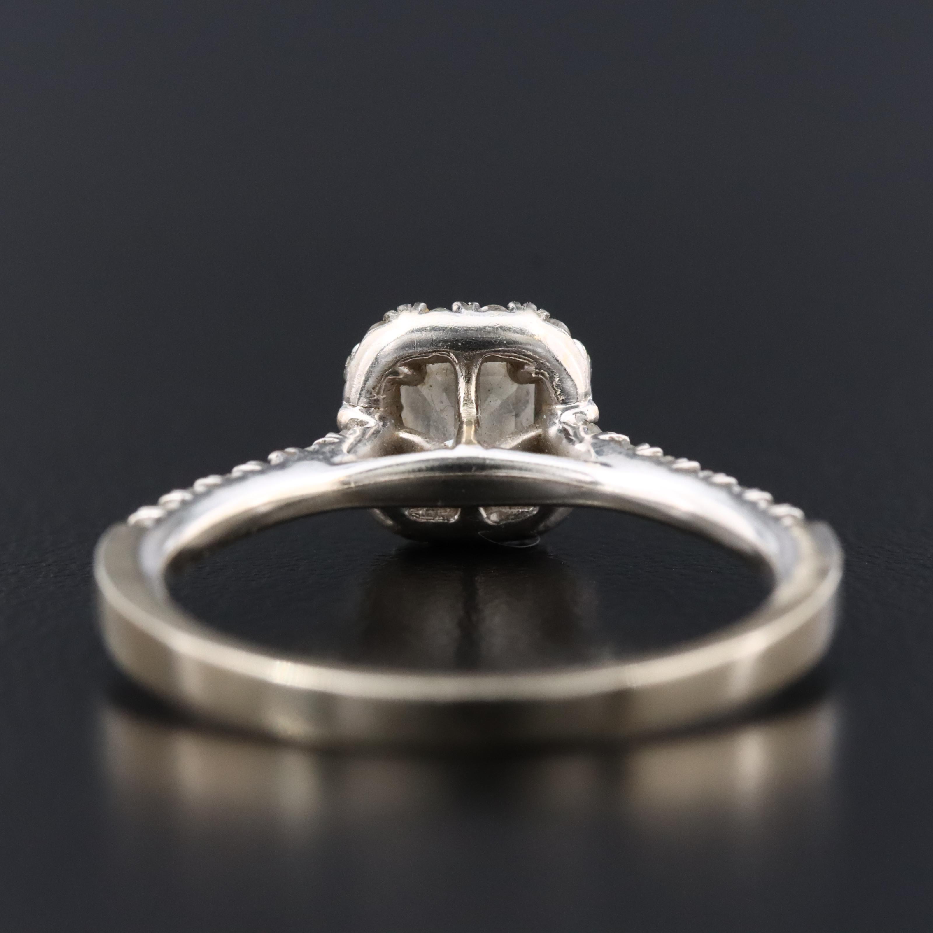 14K 0.66 CTW Diamond Halo Ring