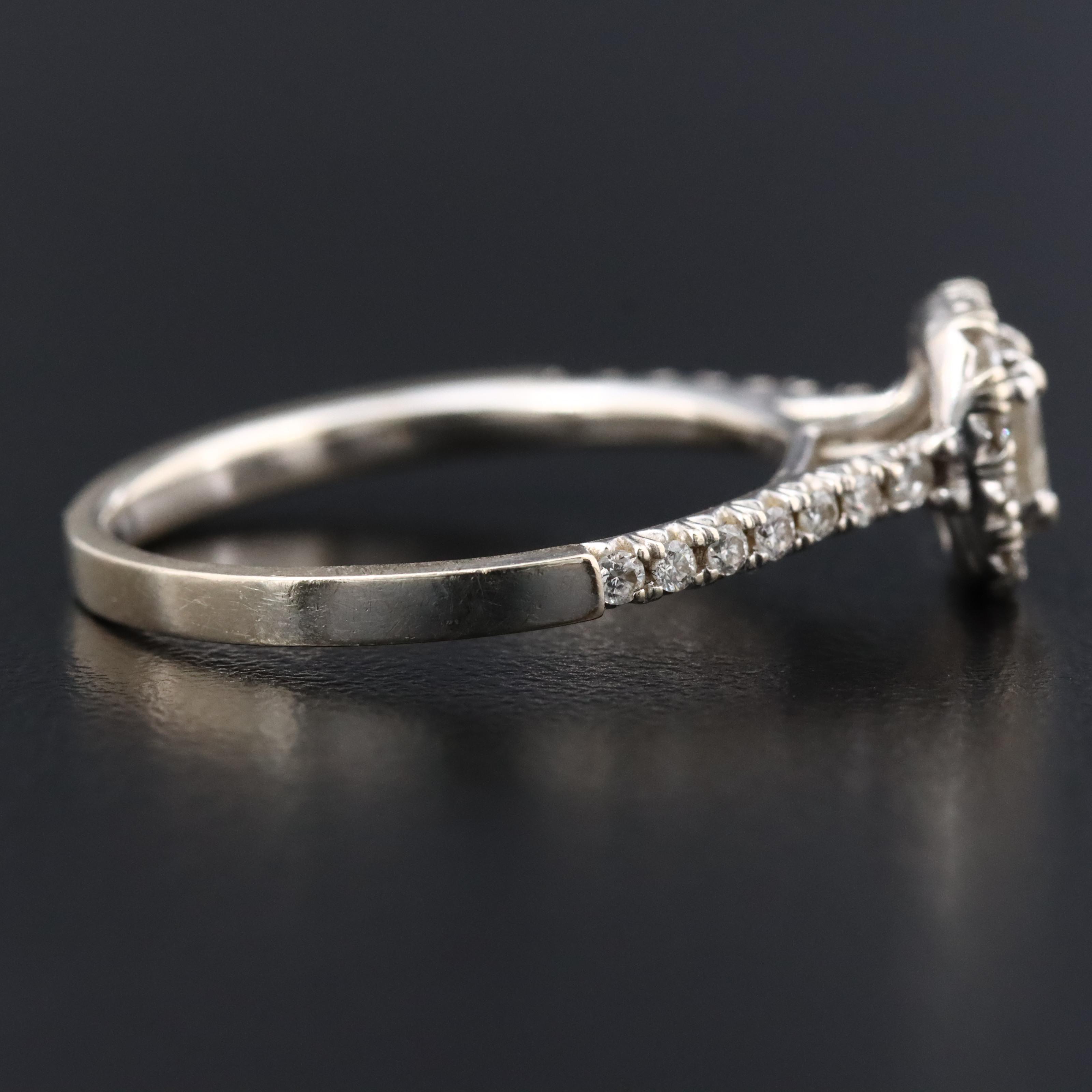 14K 0.66 CTW Diamond Halo Ring