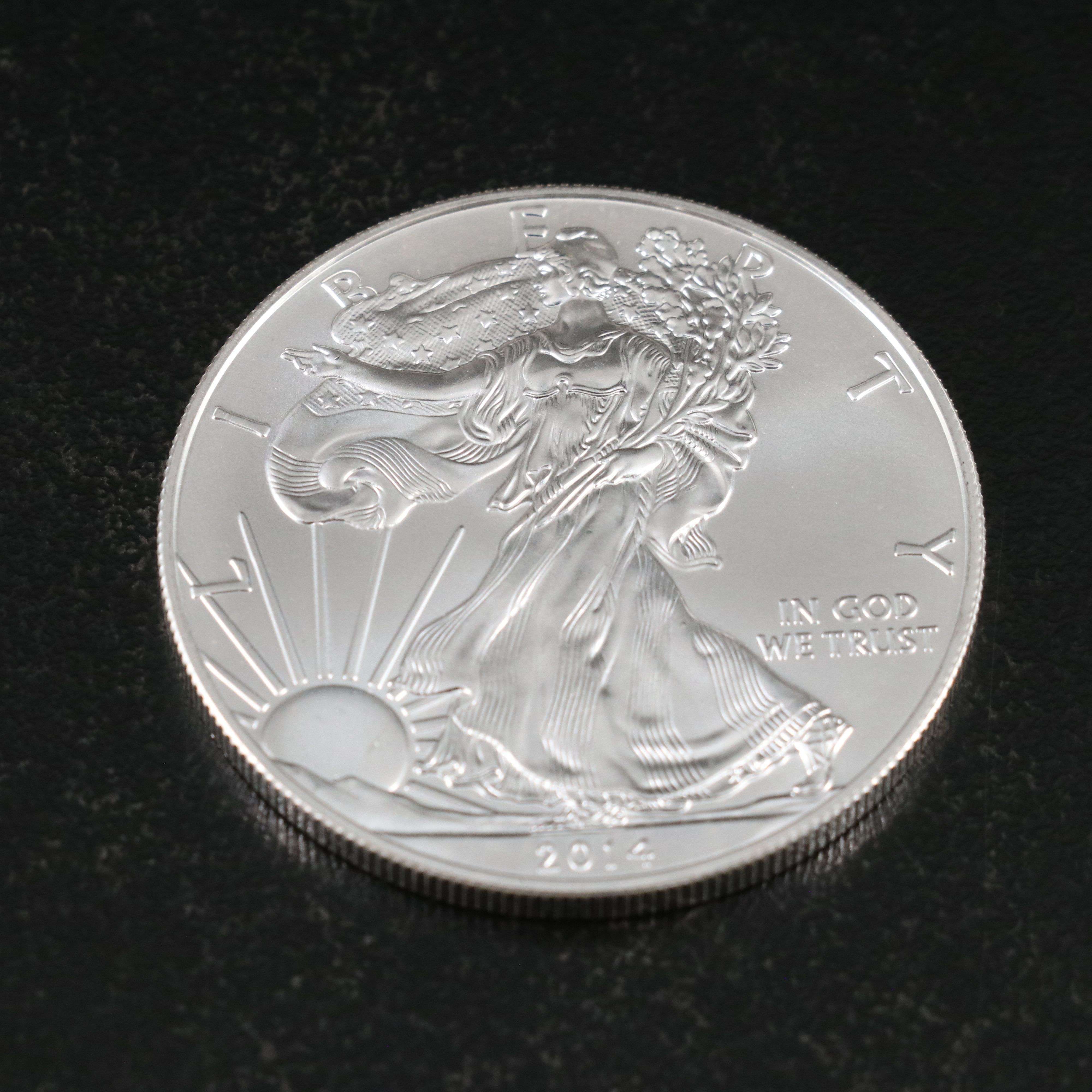 Three 2014 U.S. Silver Eagles
