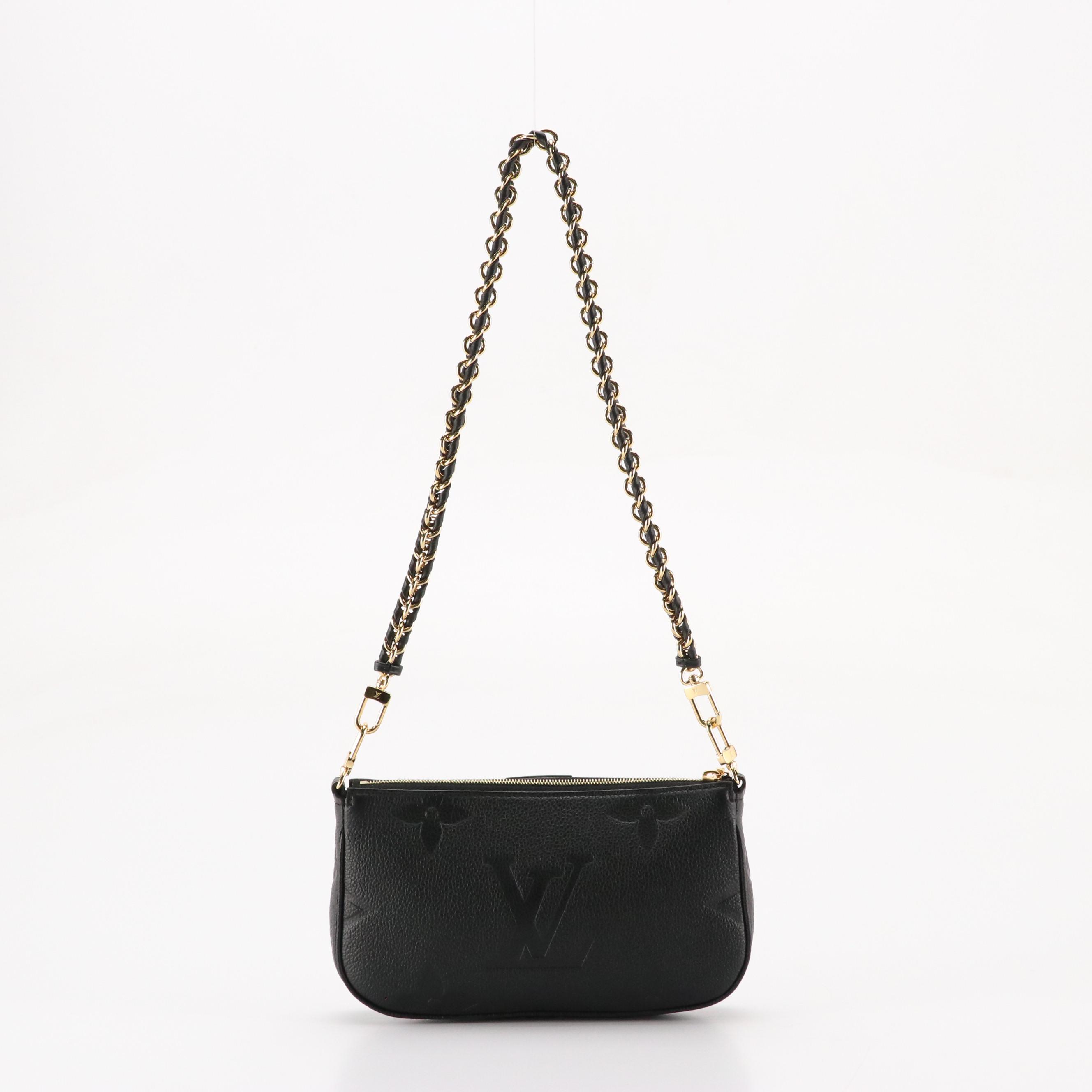 Louis Vuitton Pochette Accessoires in Black Monogram Empreinte Giant Leather