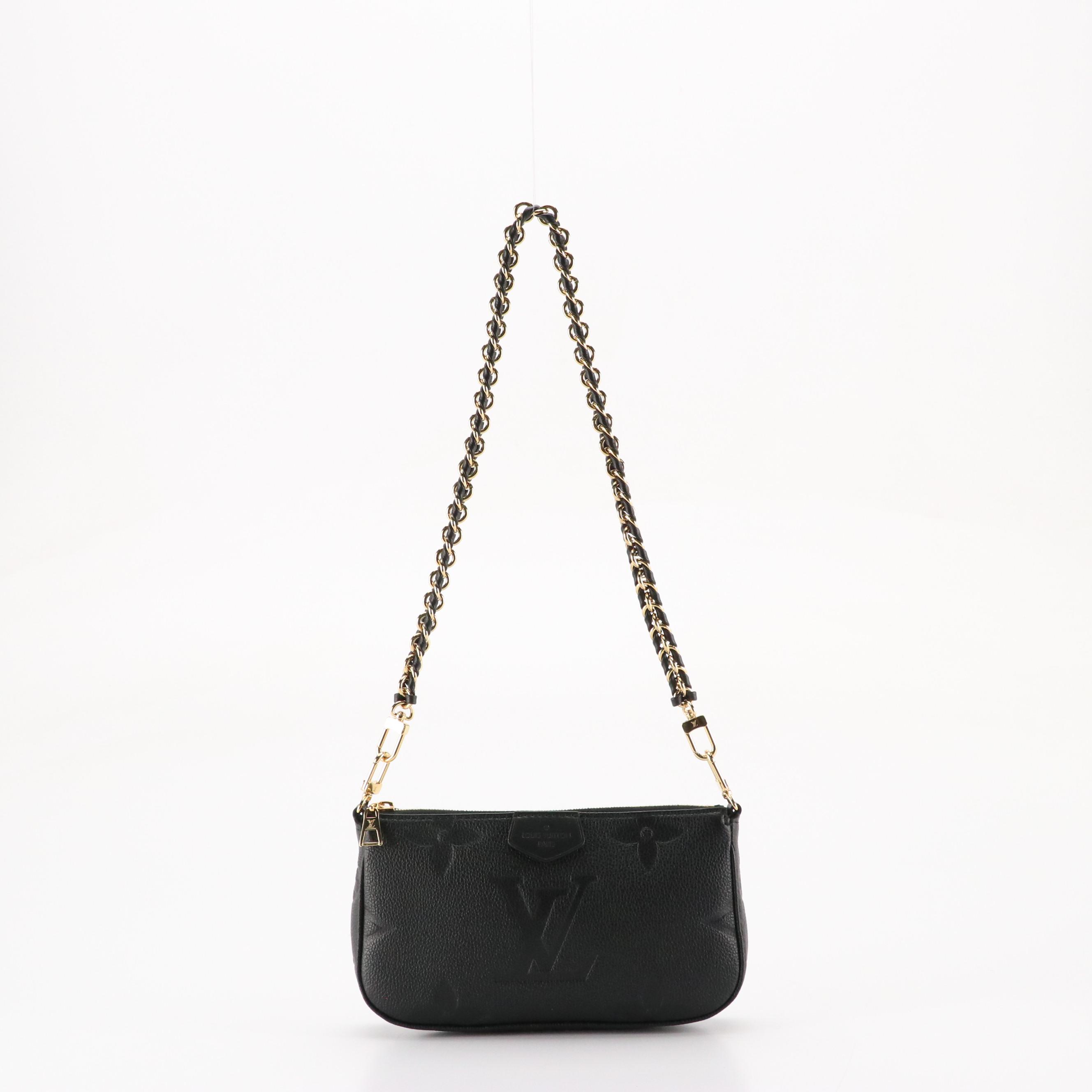 Louis Vuitton Pochette Accessoires in Black Monogram Empreinte Giant Leather