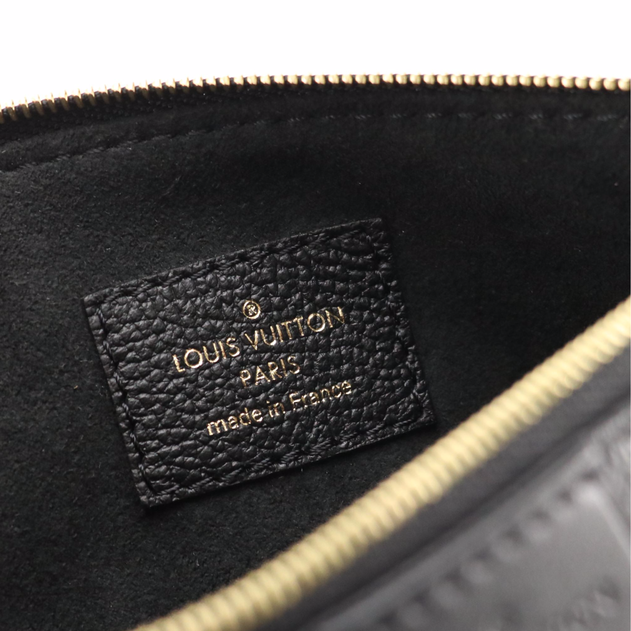 Louis Vuitton Pochette Accessoires in Black Monogram Empreinte Giant Leather