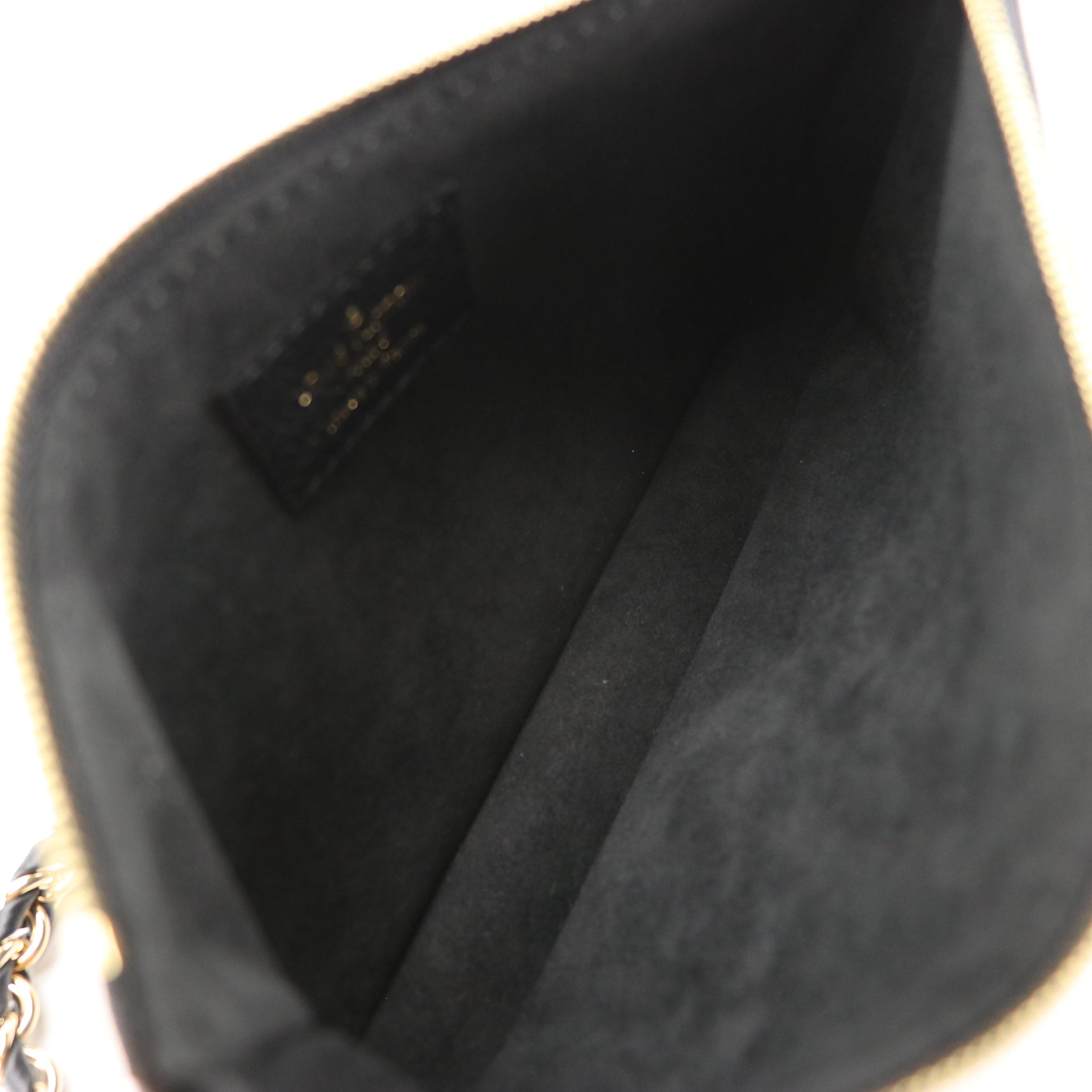 Louis Vuitton Pochette Accessoires in Black Monogram Empreinte Giant Leather